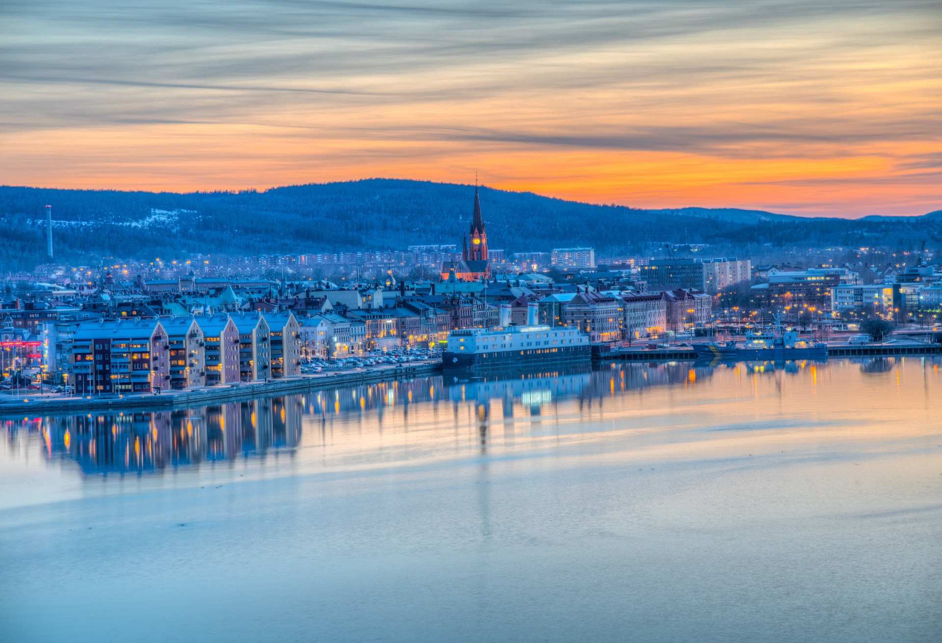 Sunset aerial view of Swedish town Sundsvall; Shutterstock ID 1499286497; Purpose: Landing page; Brand (KAYAK, Momondo, Any): momondo