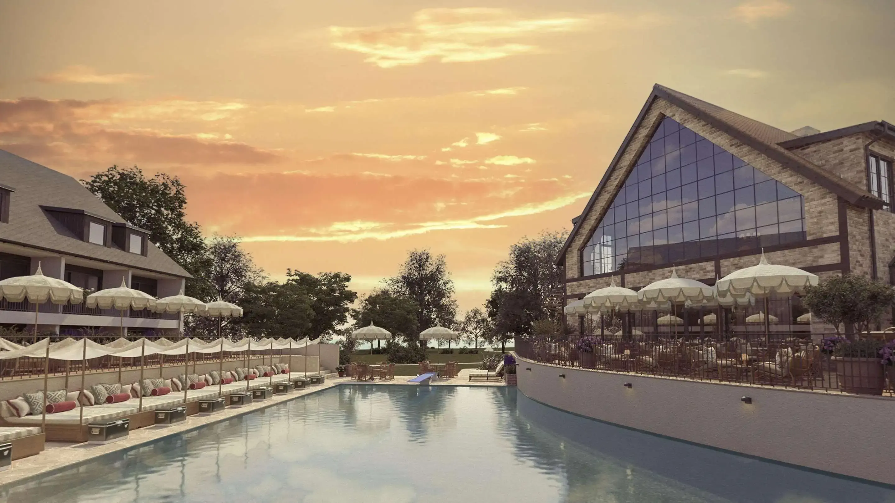 a hotel building from the outside with a pool and sunbeds 