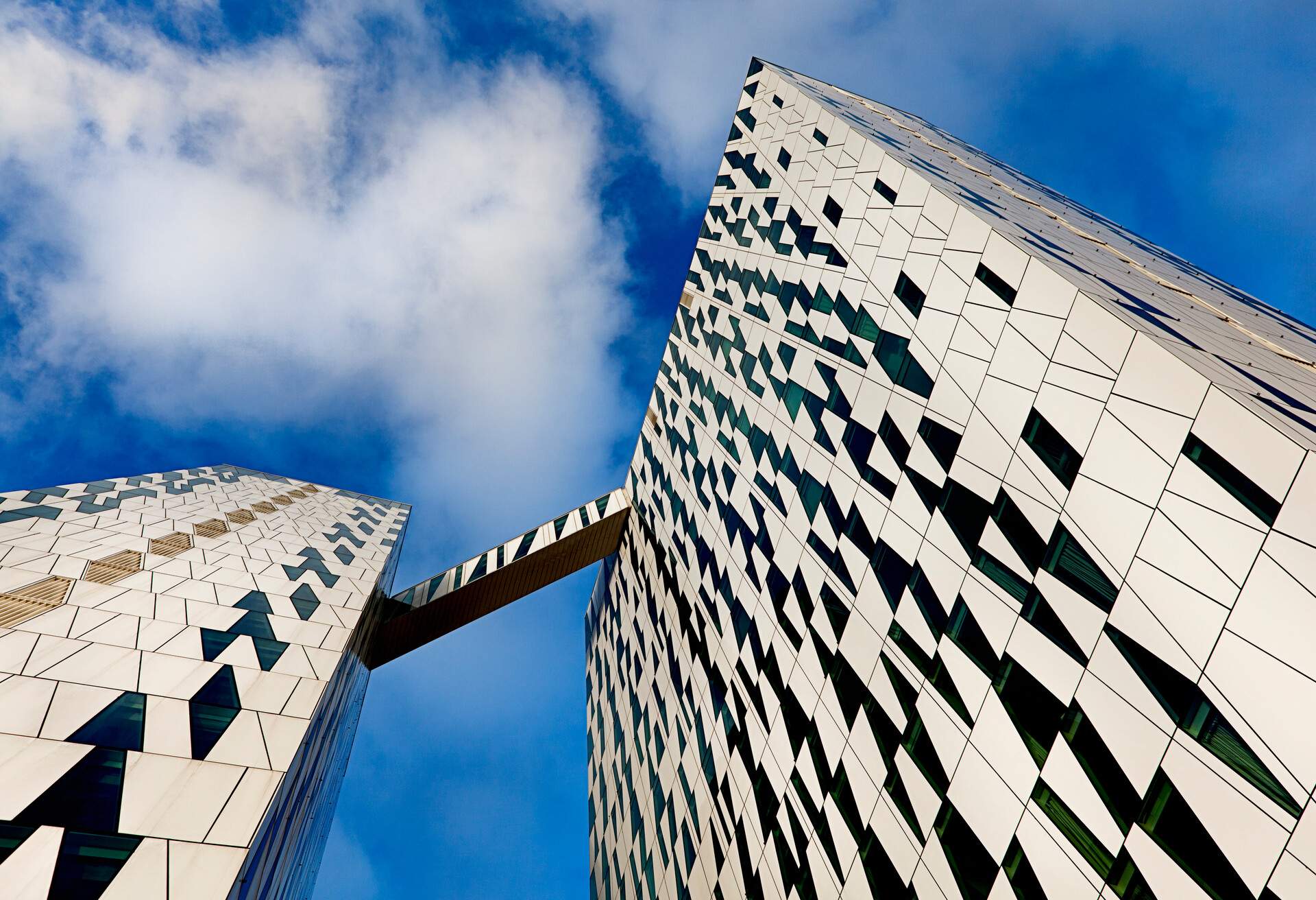 contemporary building facade of the bella sky hotel in copenhagen, denmark. the hotel became a landmark of the new copenhagen.