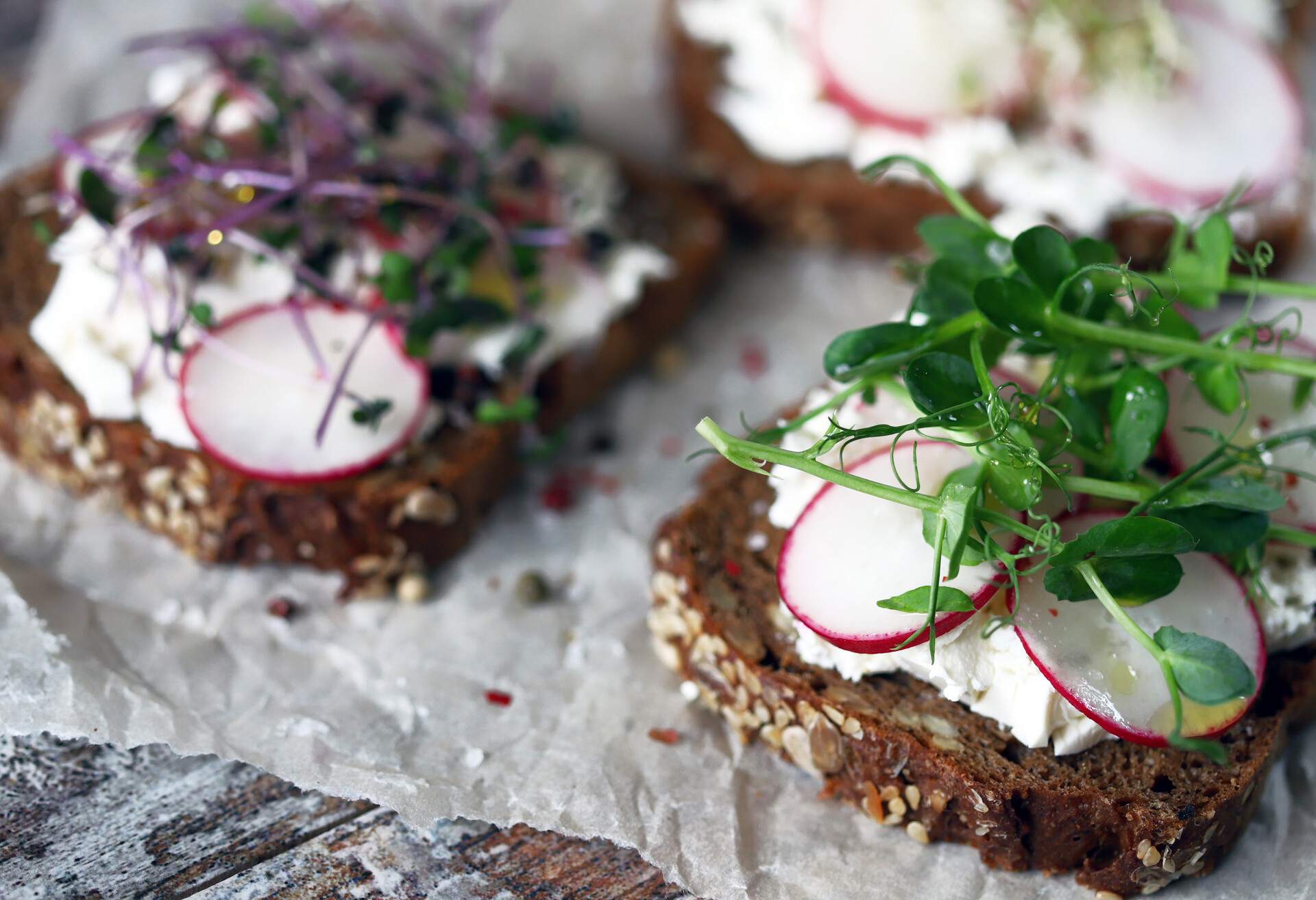 Healthy toasts with white cheese radish and microgreens. Cooking at home. Flat lay. Keto diet. Keto toasts. Organic food. Super food.