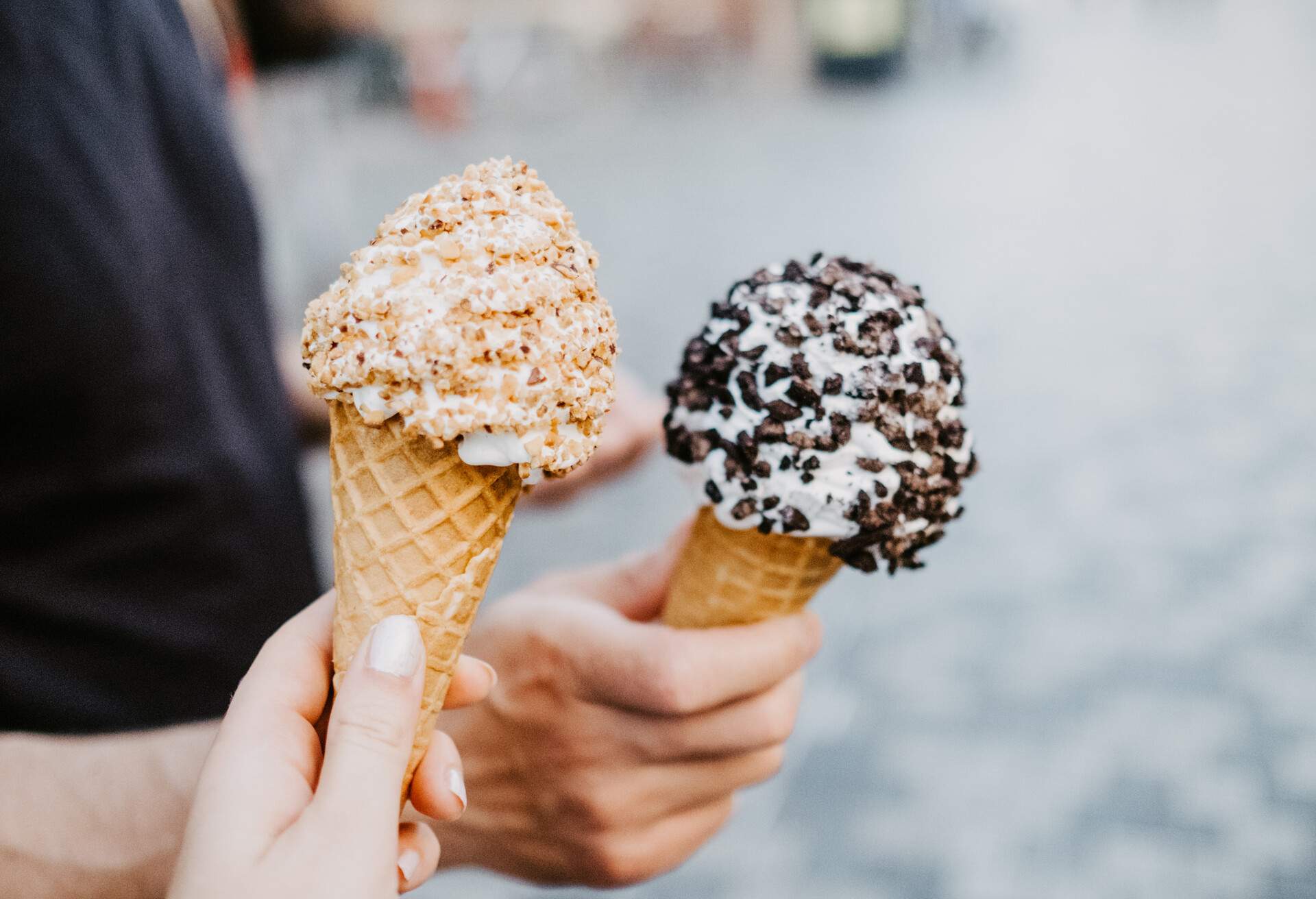 Hands Holding Ice Cream Cones