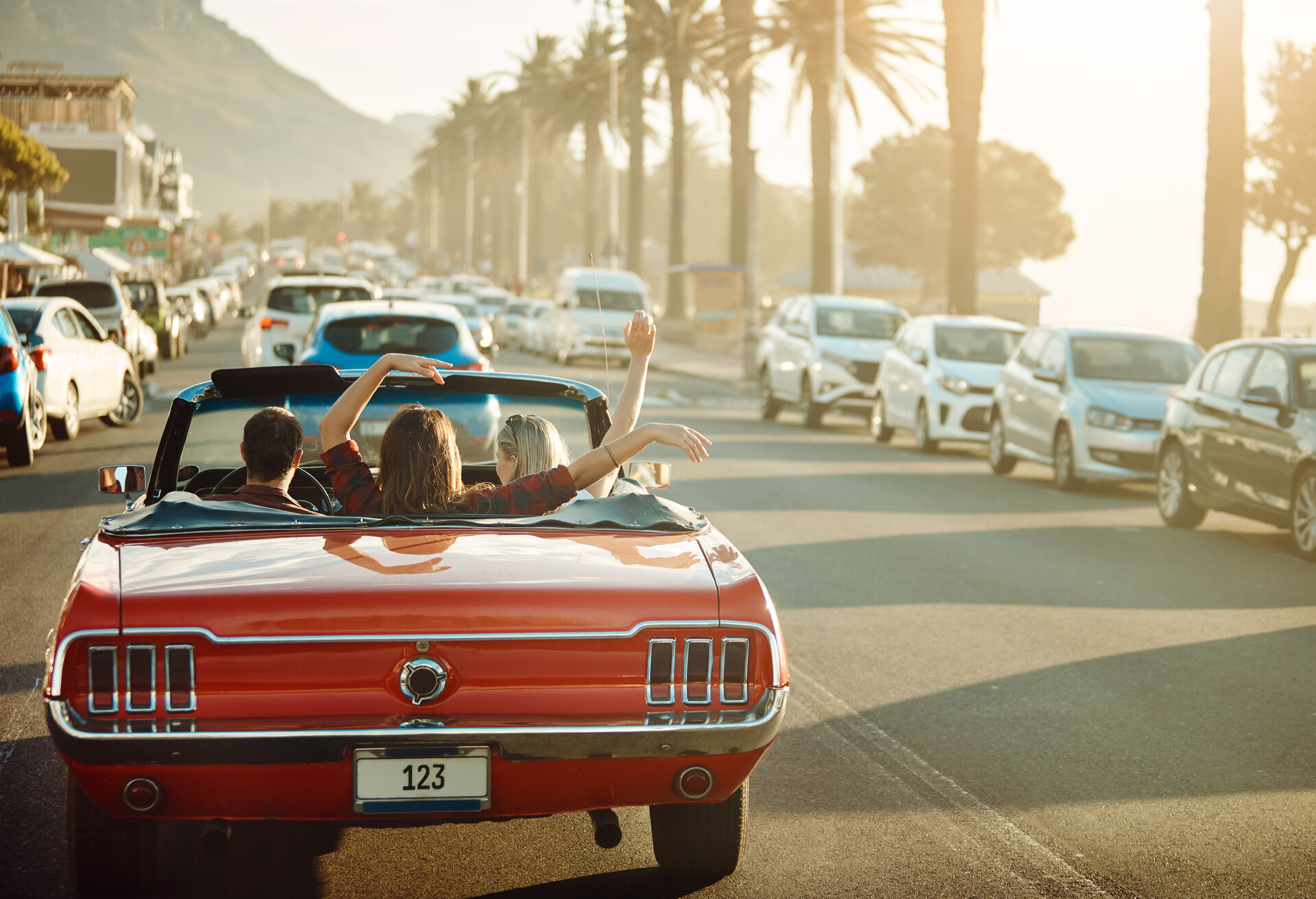 theme_car_vehicle_convertible_sunset_people_vacation-gettyimages