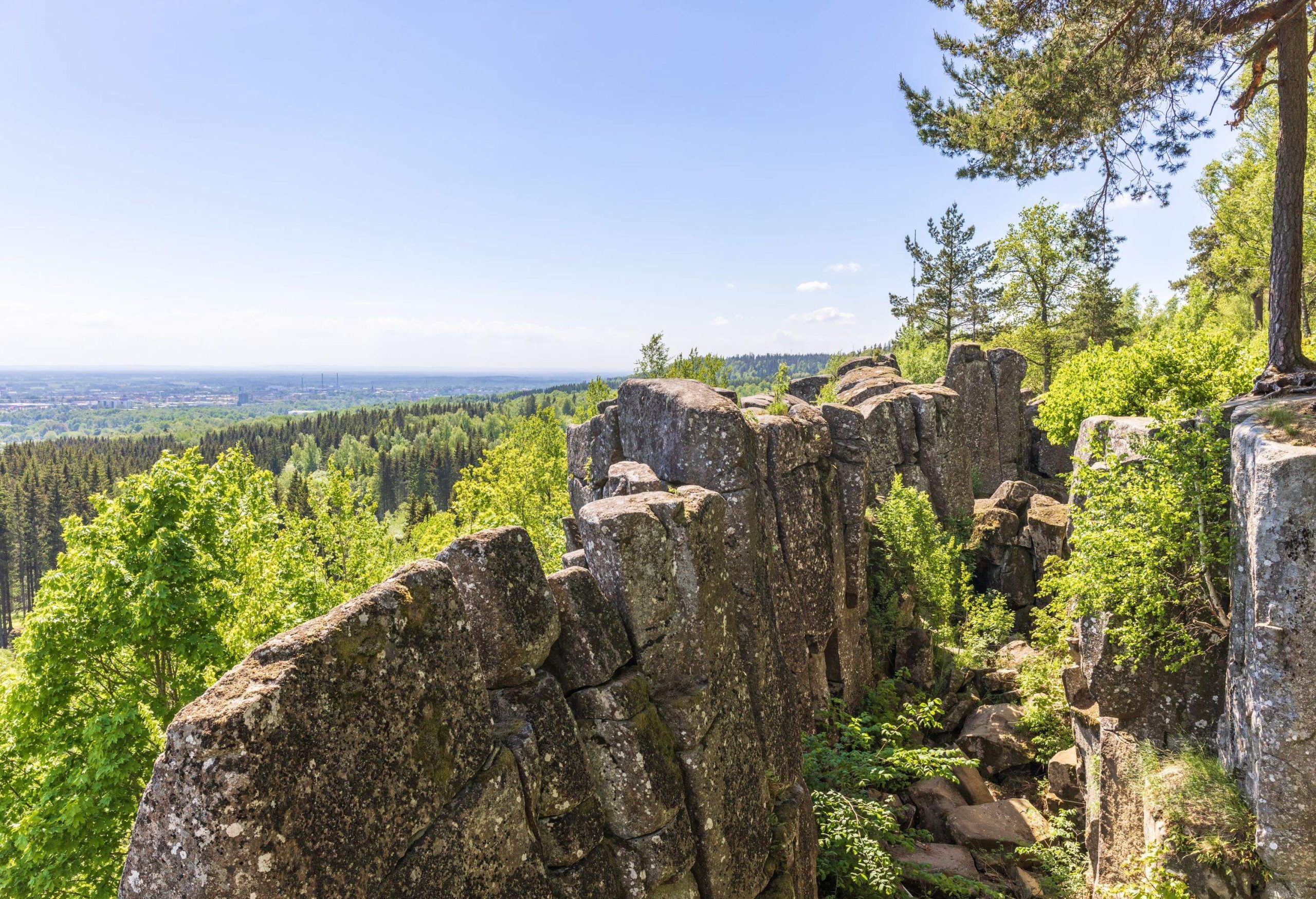 Rock crevice on a mountain with a landscape view