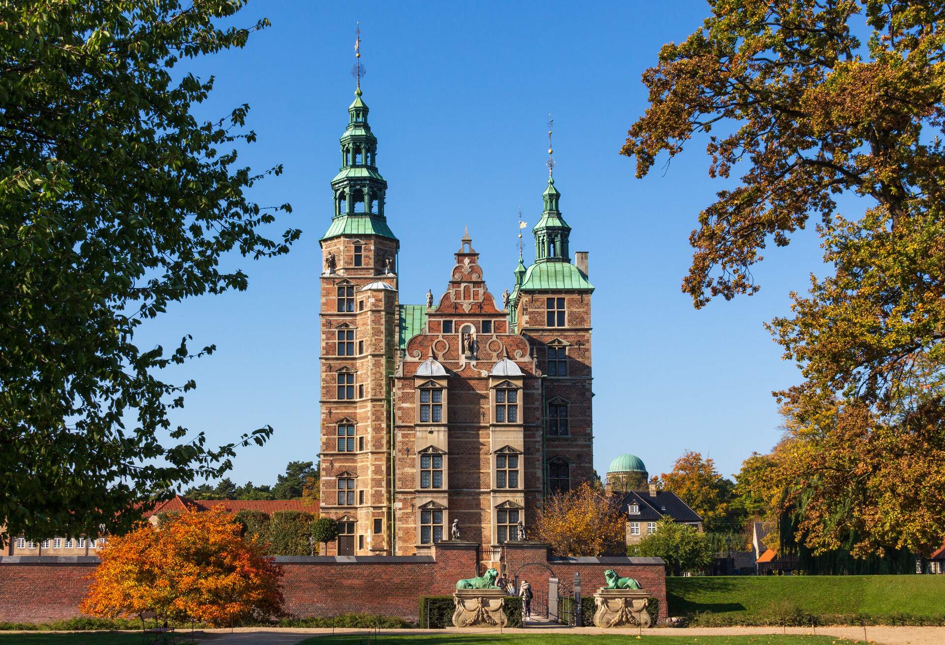 Portrait of Rosenborg Castle in Copenhagen surrounded by trees; Shutterstock ID 1394088275