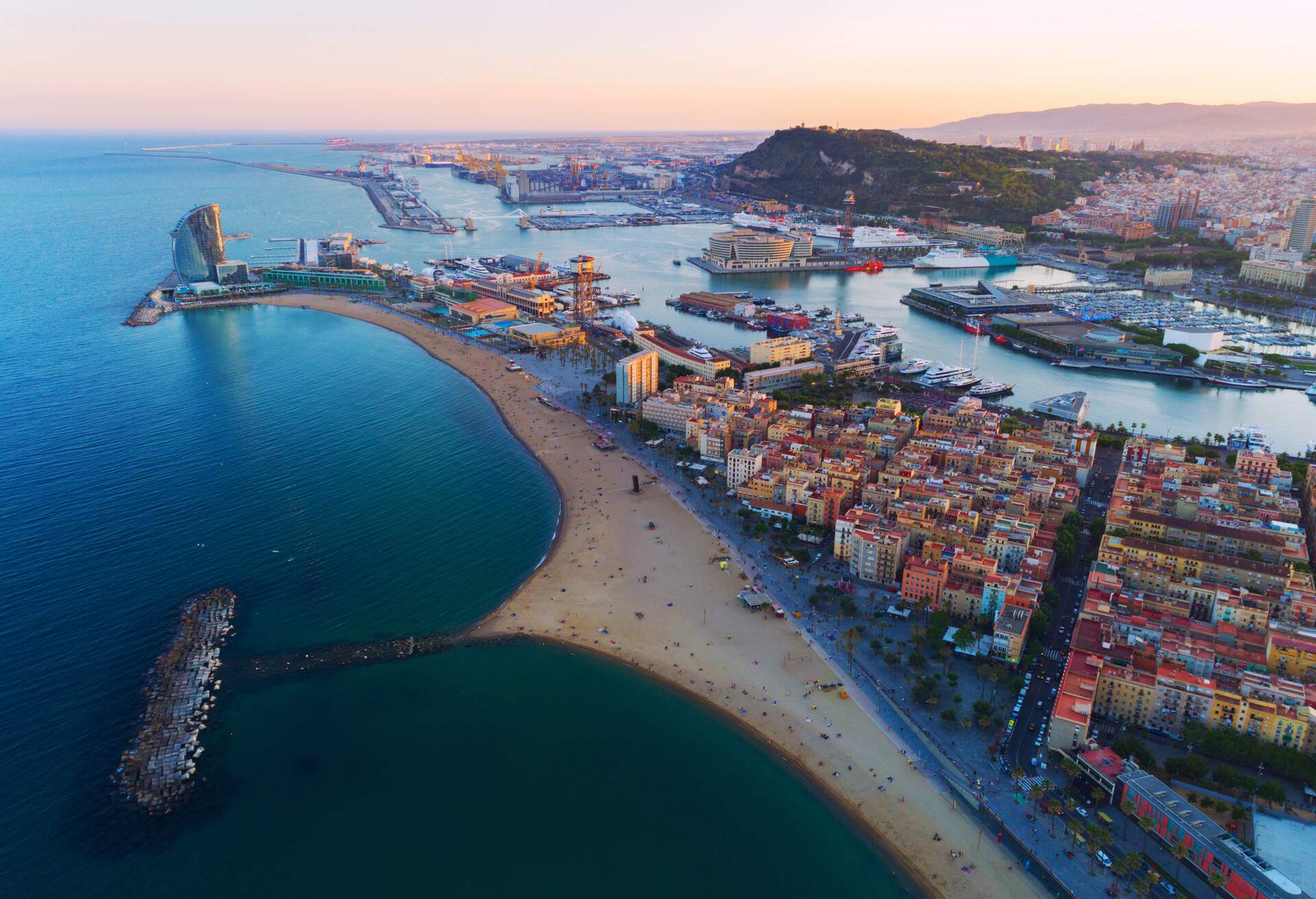 Aerial view of Barcelona.. Barceloneta beach and Port Olimpic; Shutterstock ID 666236398