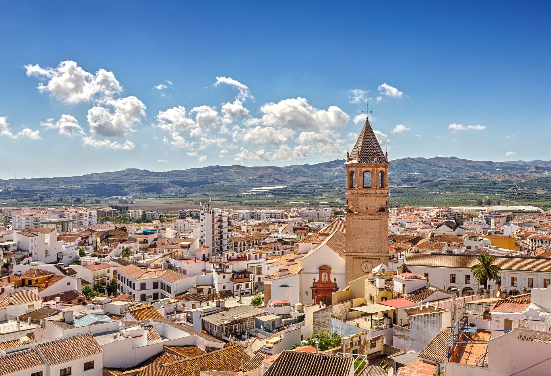 Iglesia de San Juan Bautista, Plaza de la Constitucion of Velez-Malaga. Velez-Malaga, Costa del Sol, Andalucía, Spain. ; Shutterstock ID 1215744199; purchase_order: ; job: ; client: ; other: