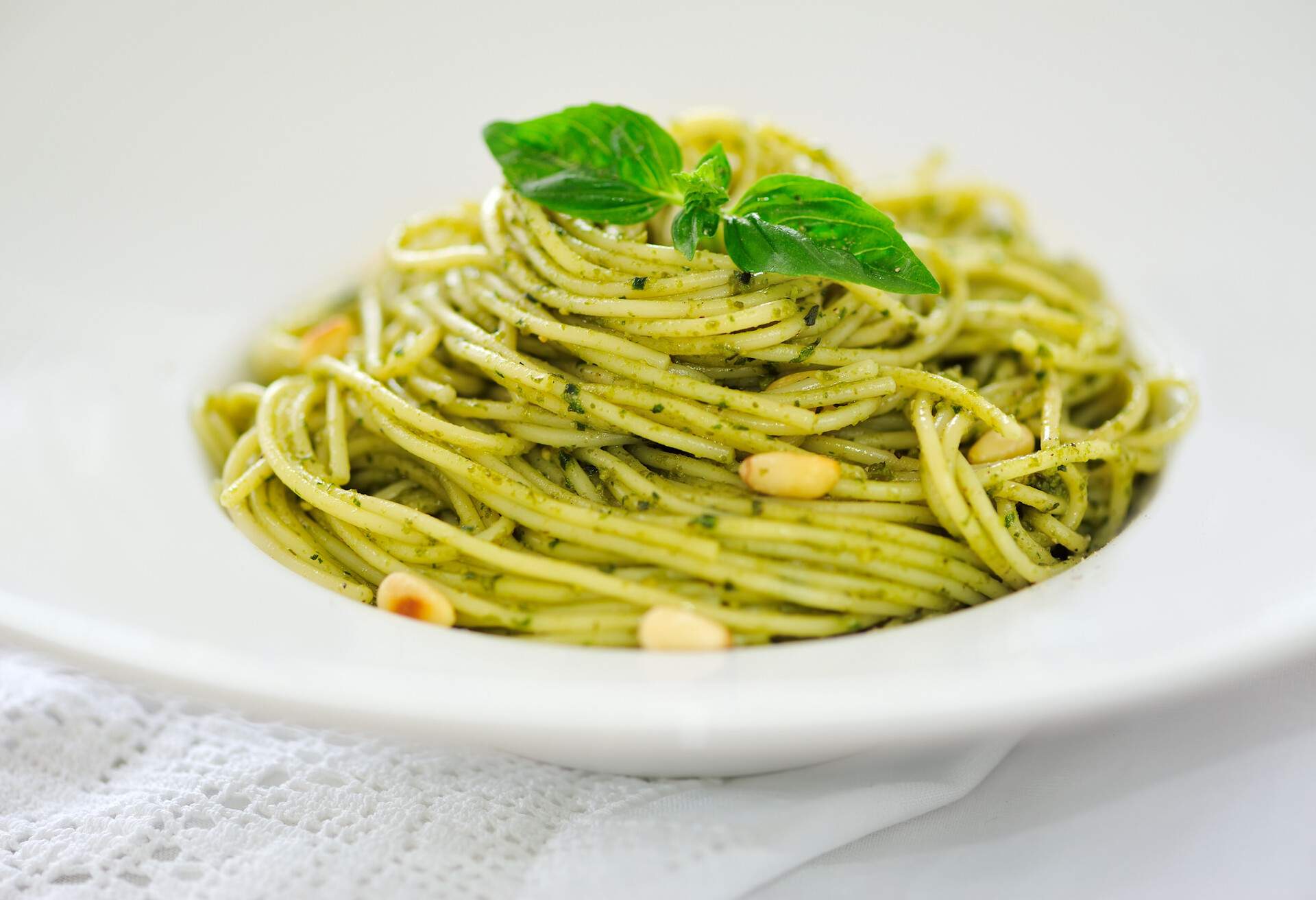 Pasta with Basil Pesto on Plate, Garnished with Basil Leaves