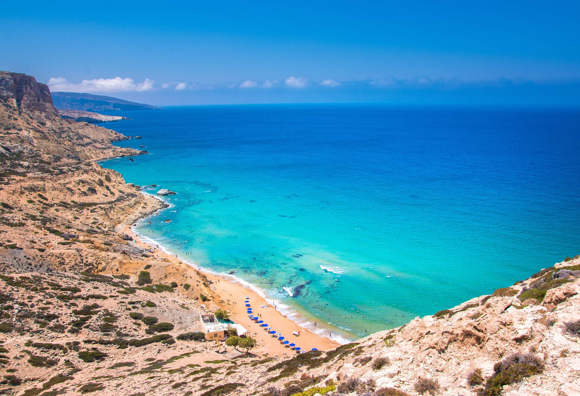 The nudist beach of kokkini ammos (red sand) at Matala, Crete, Greece.