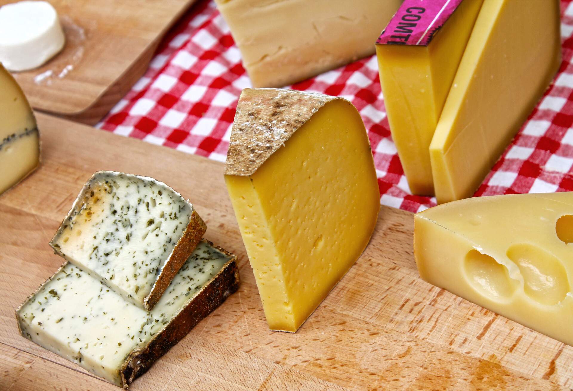 Various types of cheese on table