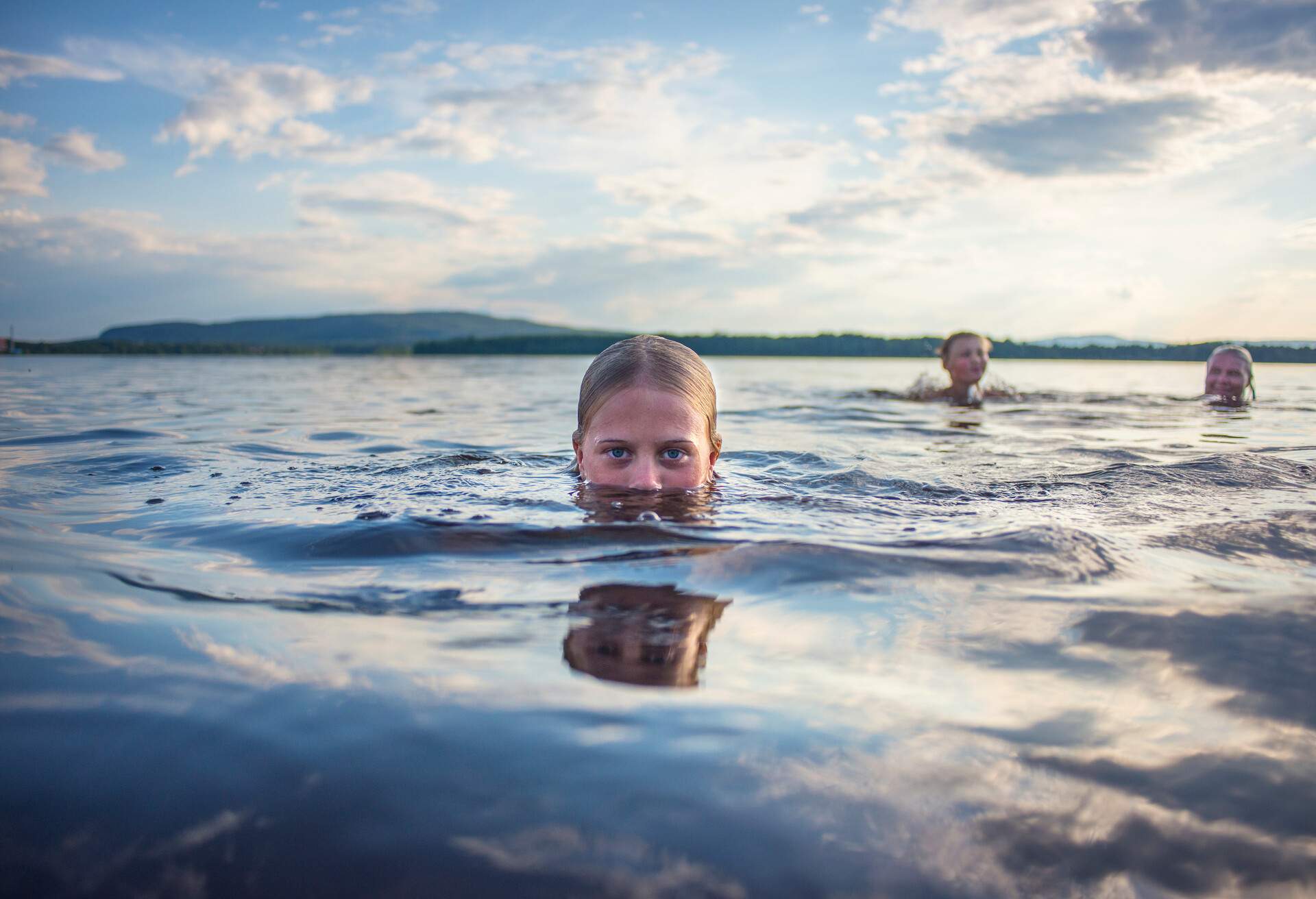 THEME_PEOPLE_GIRL_SWIMMING_LAKE_GettyImages