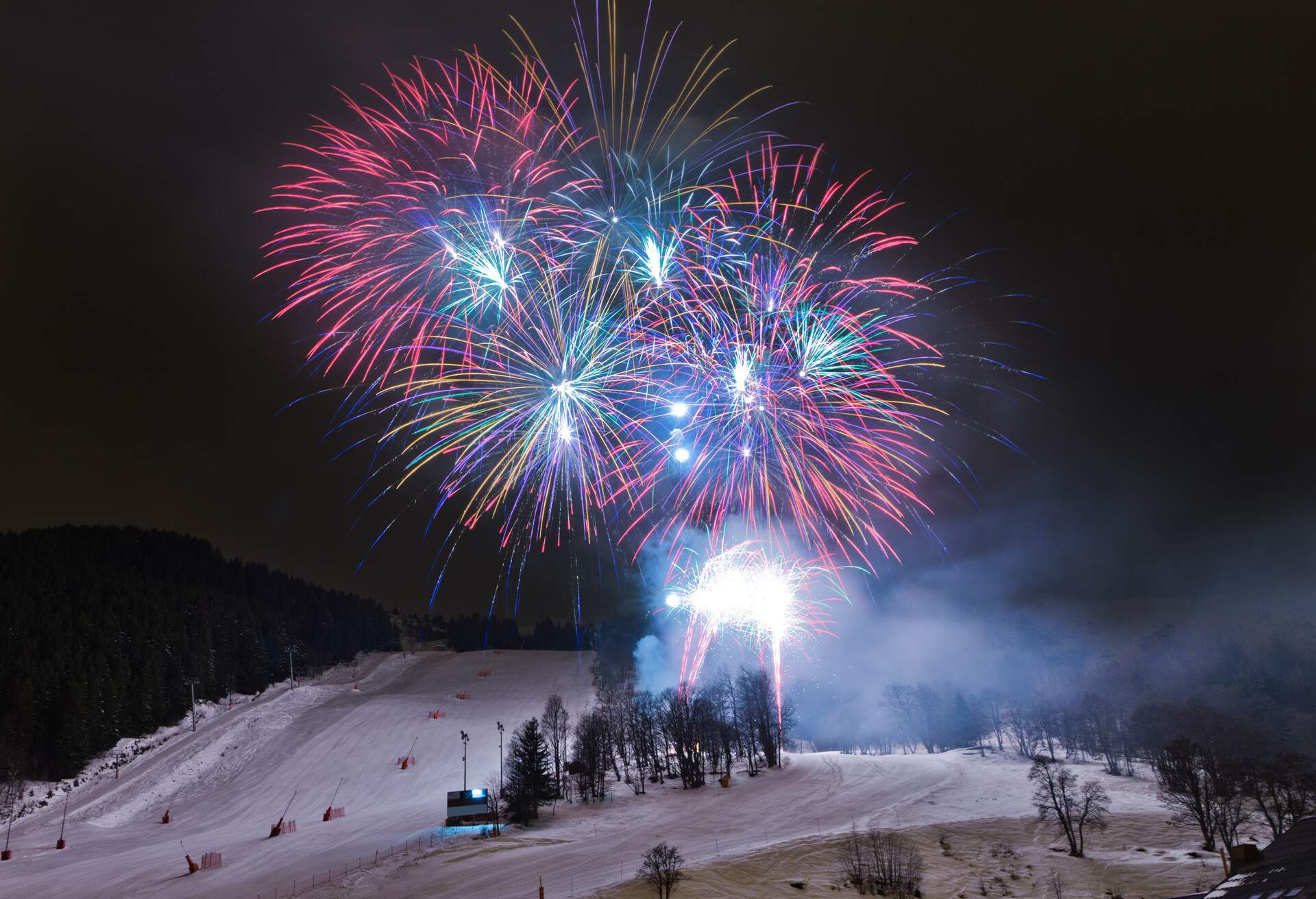 Fireworks are shot for the elebration of russian christmas. in Meribel, France.The haute savoie has become a top destination for rich russianple rich people; Shutterstock ID 89174161