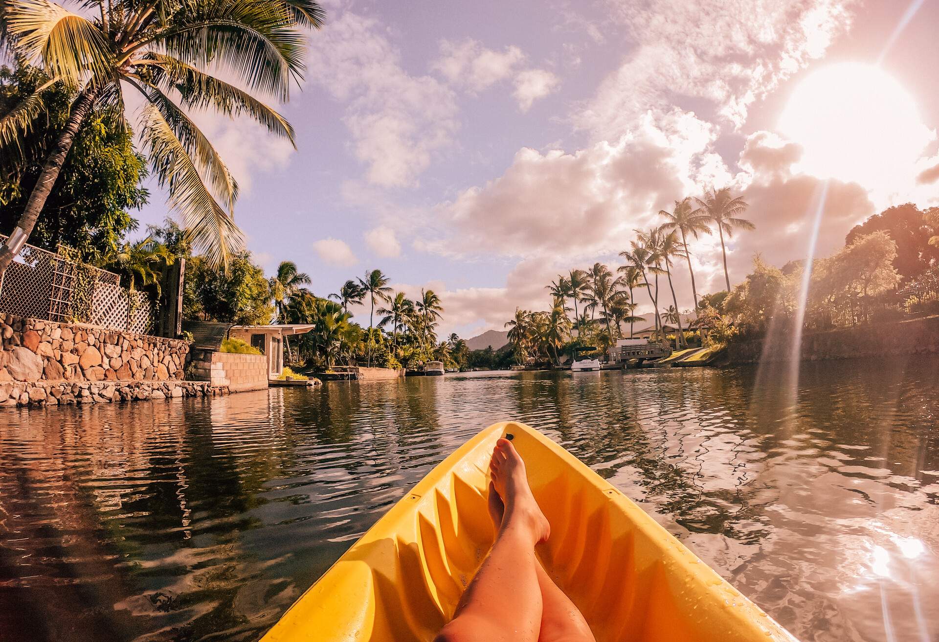 DEST_HAWAII_HONOLULU_THEME_WOMAN_BOAT_GettyImages-1167786800