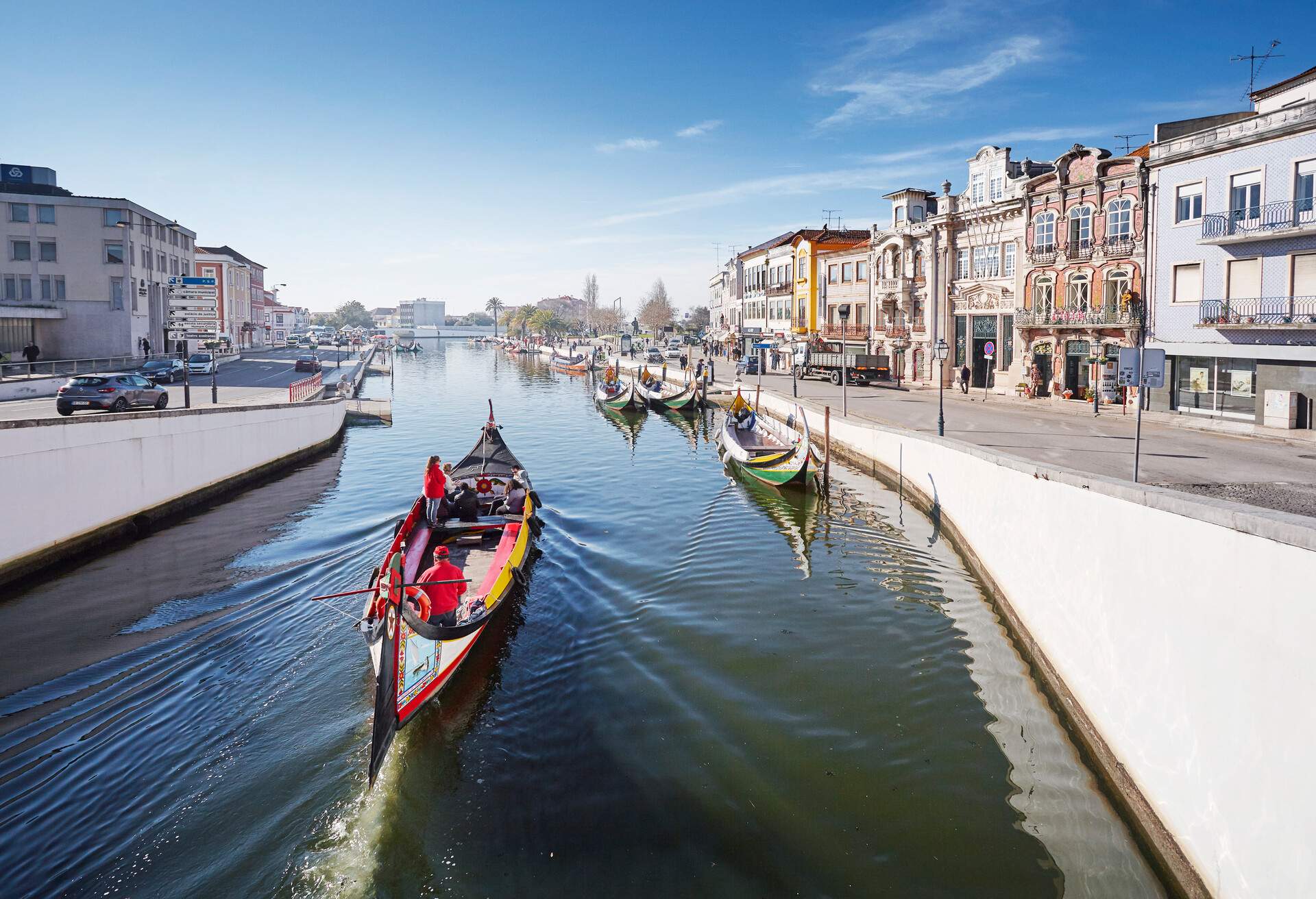 Colourful boat (barcos moliceiros) on canal in Aveiro, Portugal