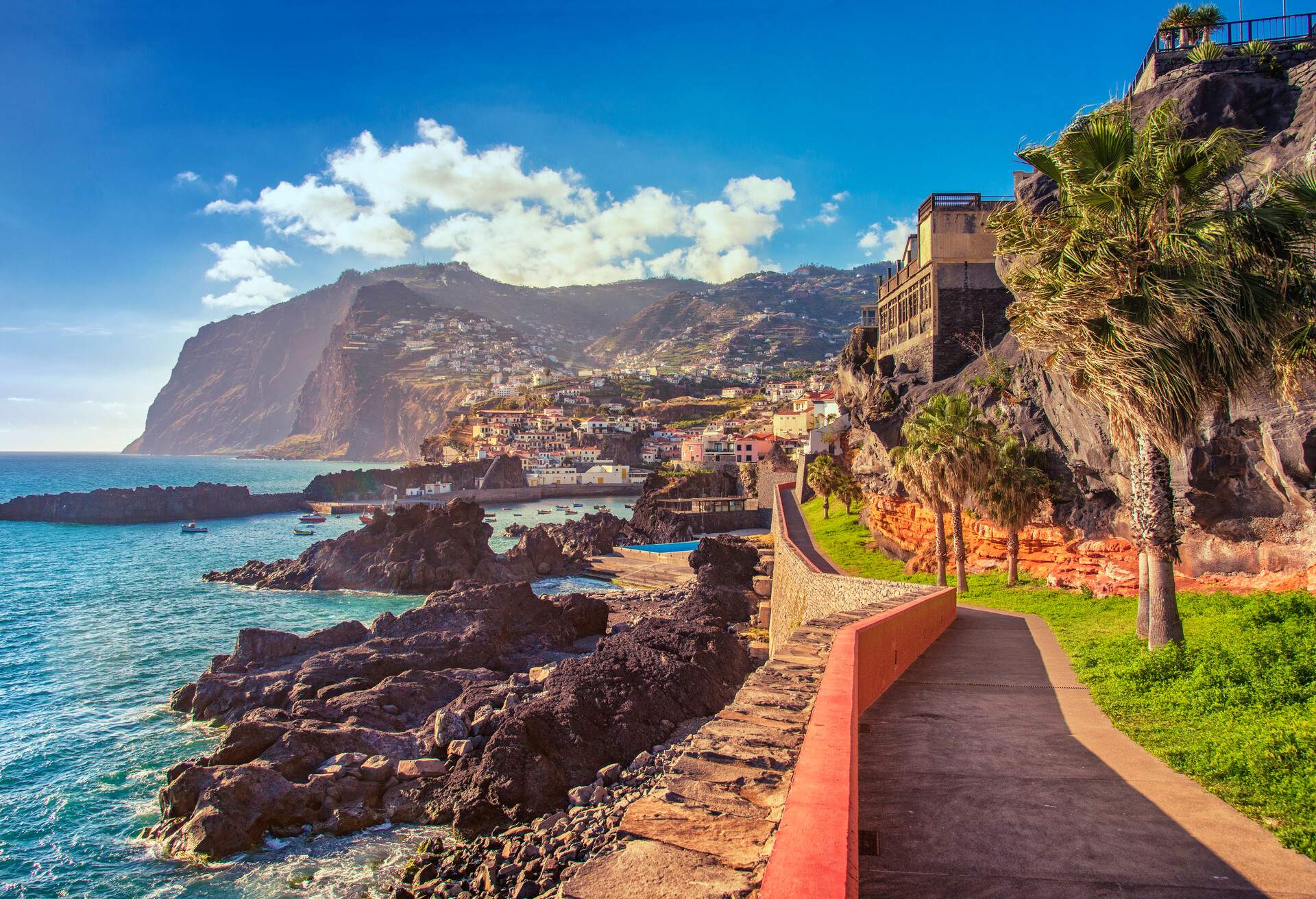 The beautifil Promenade walk from Funchal Lido into the fishing viallge of Camara de Lobos on Madeira at sunset