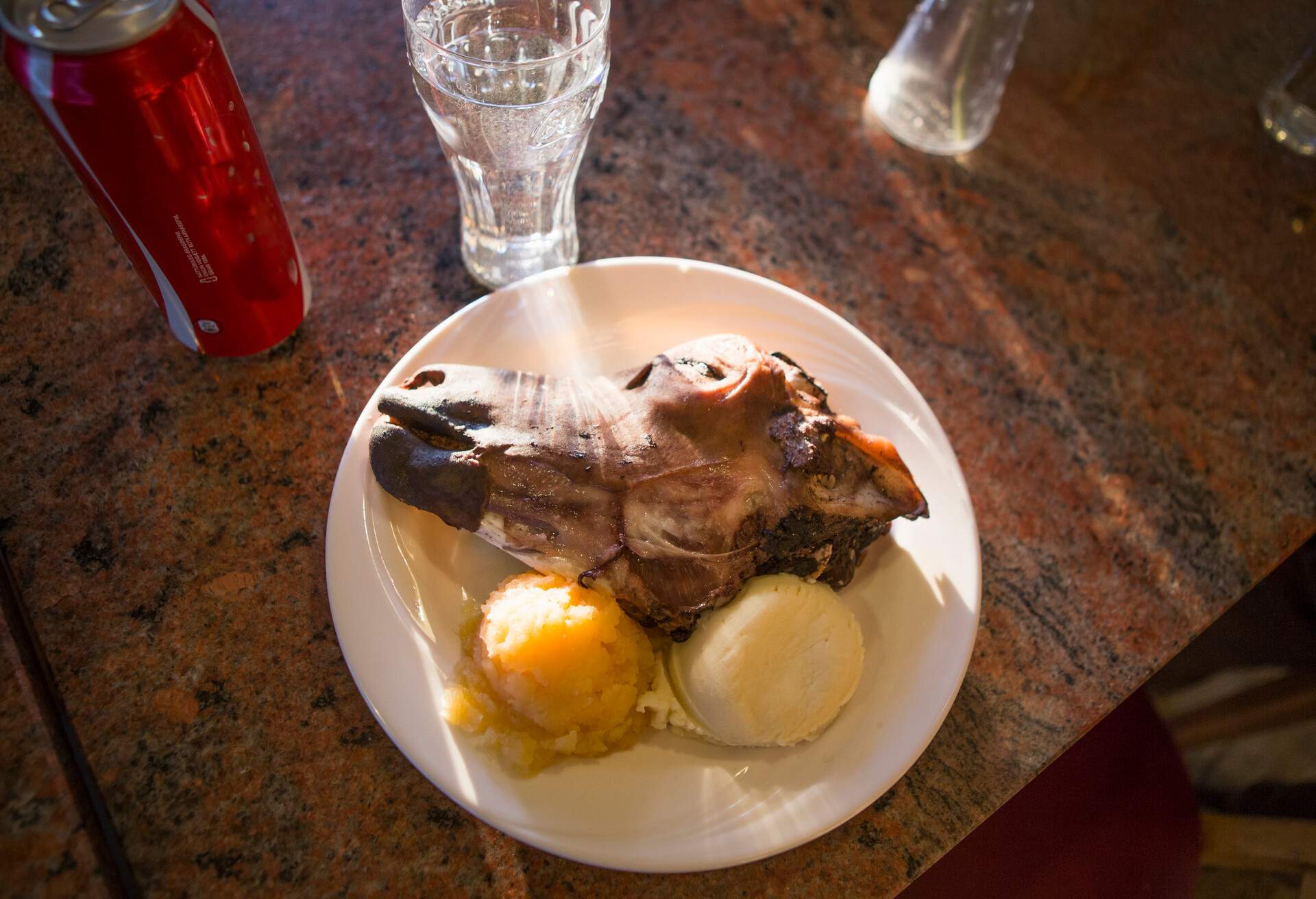 People try the local delicacy of Sheep's Head.