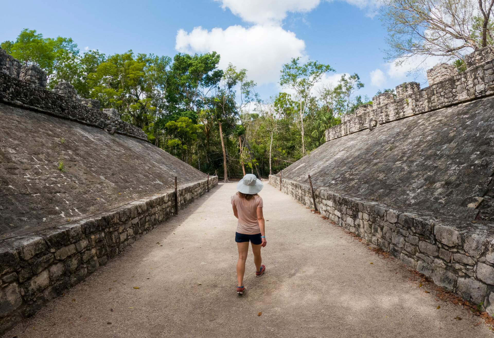 DEST_MEXICO_CANCUN_COBA_MAYAN_RUIN_CHILD_GettyImages-1315561638