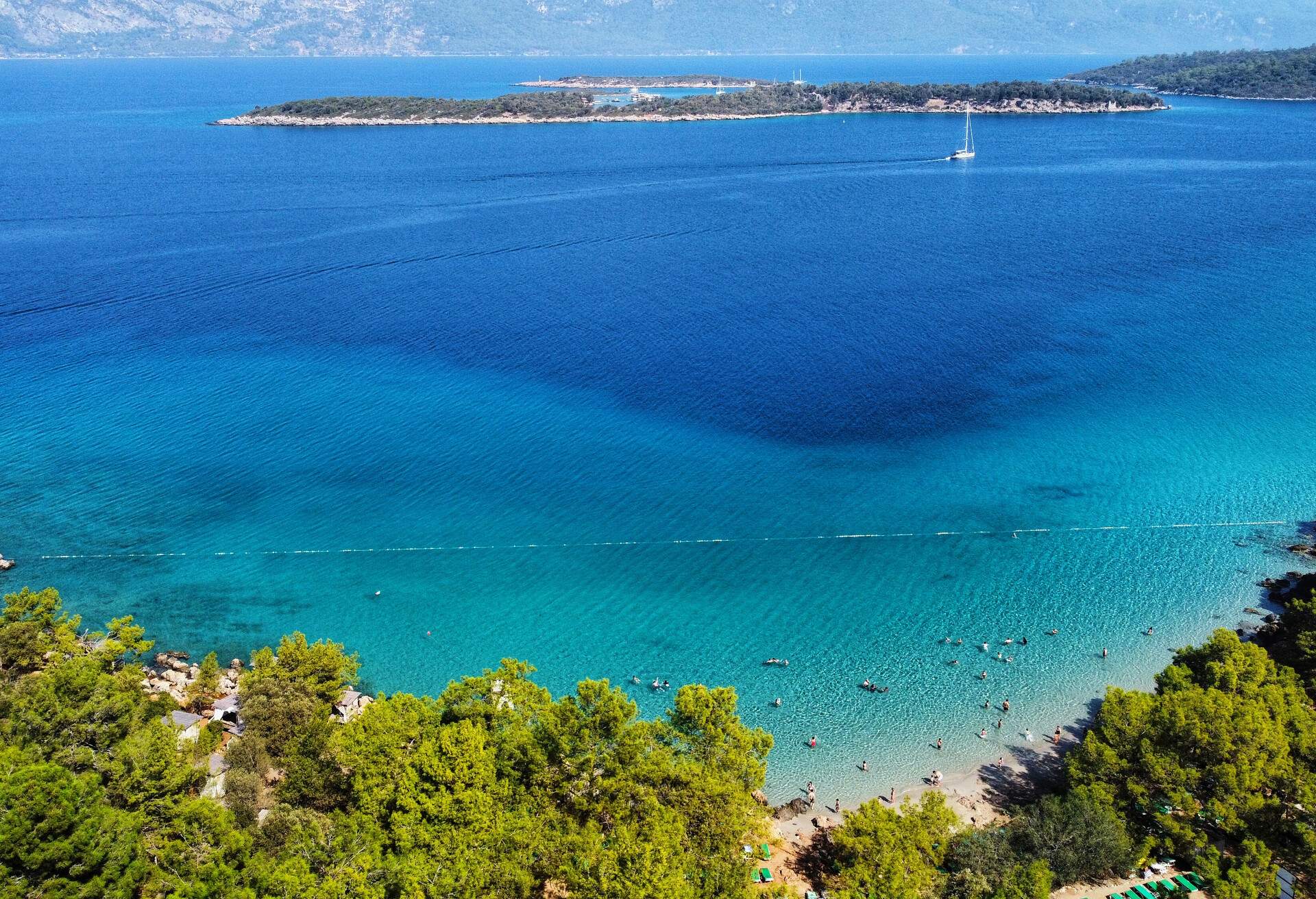 You can see Incekum Beach between trees near below and across it there is Cleopatra island. One sample of a piece of heaven on earth.