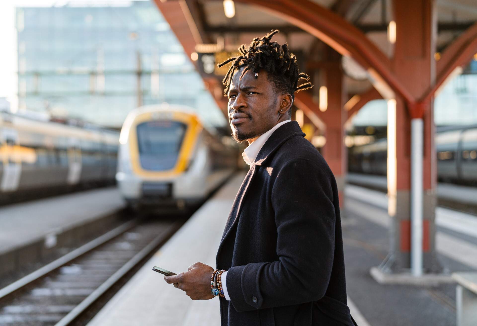 THEME_TRAIN_TRAVEL_PEOPLE_MAN_GettyImages-1299948489