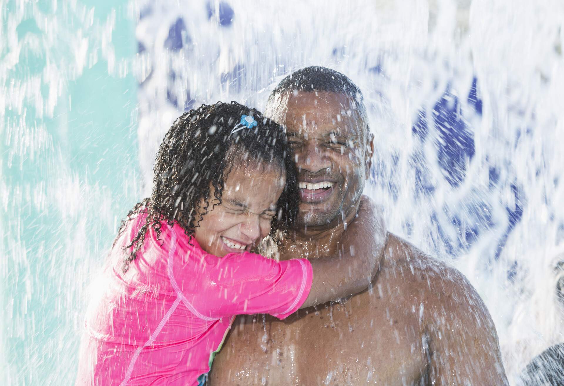 father and kid in the waterpark