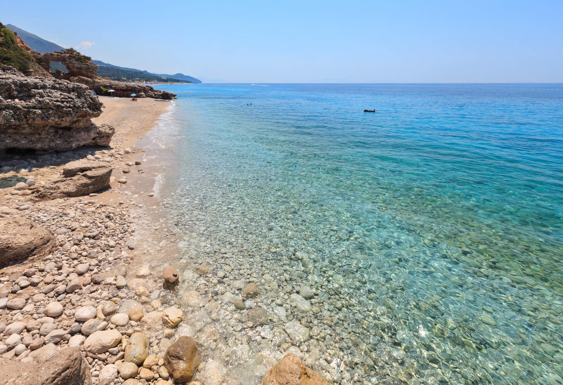 Drymades beach, Albania. Summer  Ionian sea coast view. People are unrecognizable.