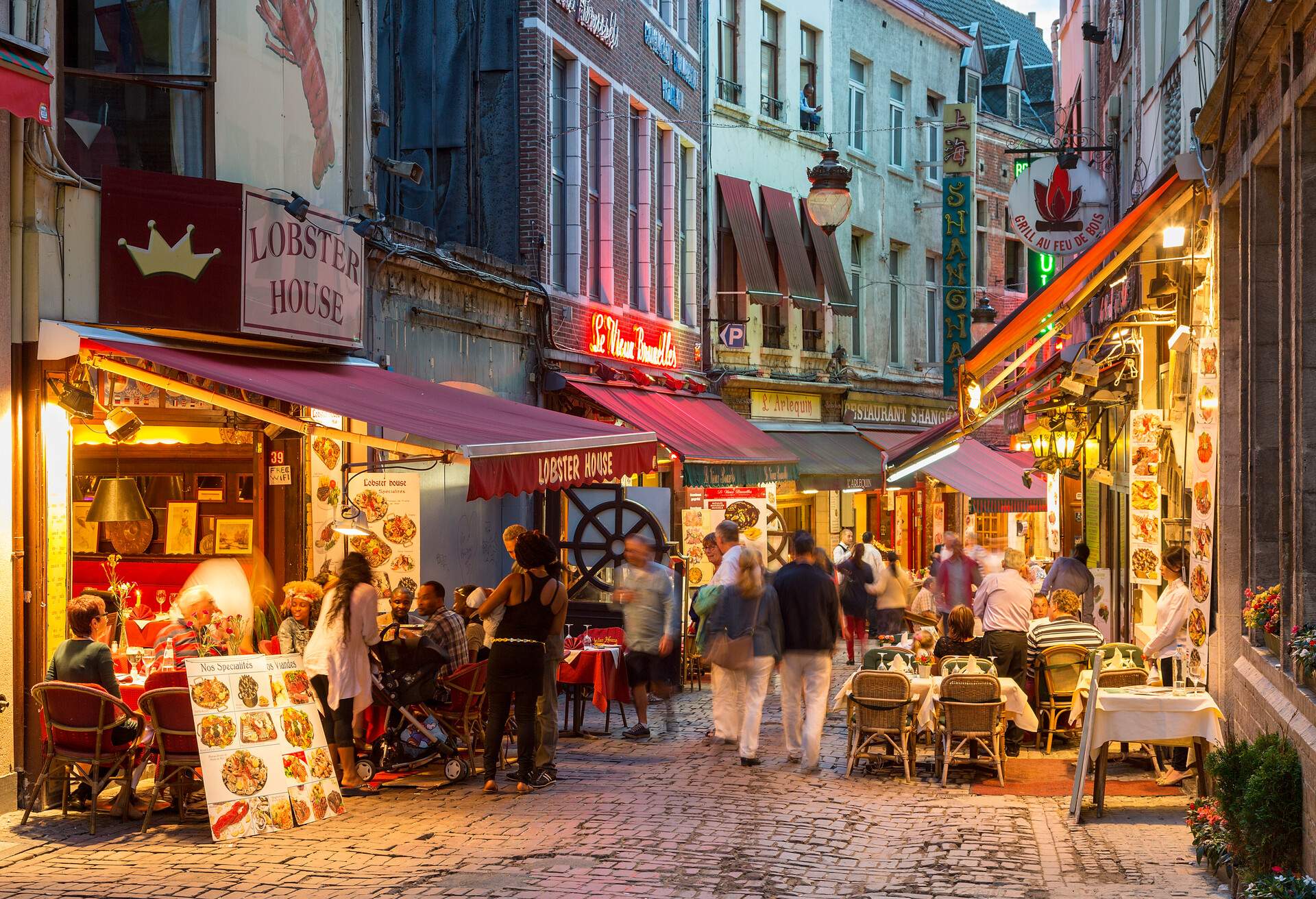 Outdoor dining in narrow street of restaurants, Brussels, Belgium, Europe