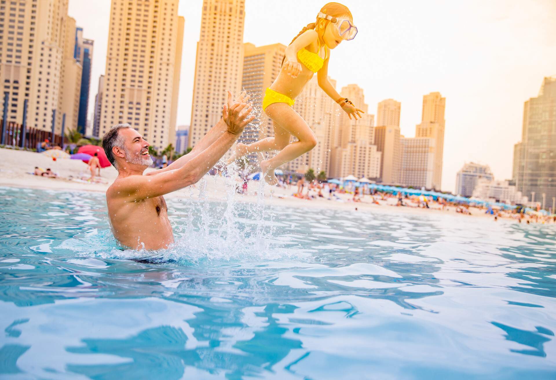 Father And Daughter Enjoying At The Dubai Beach