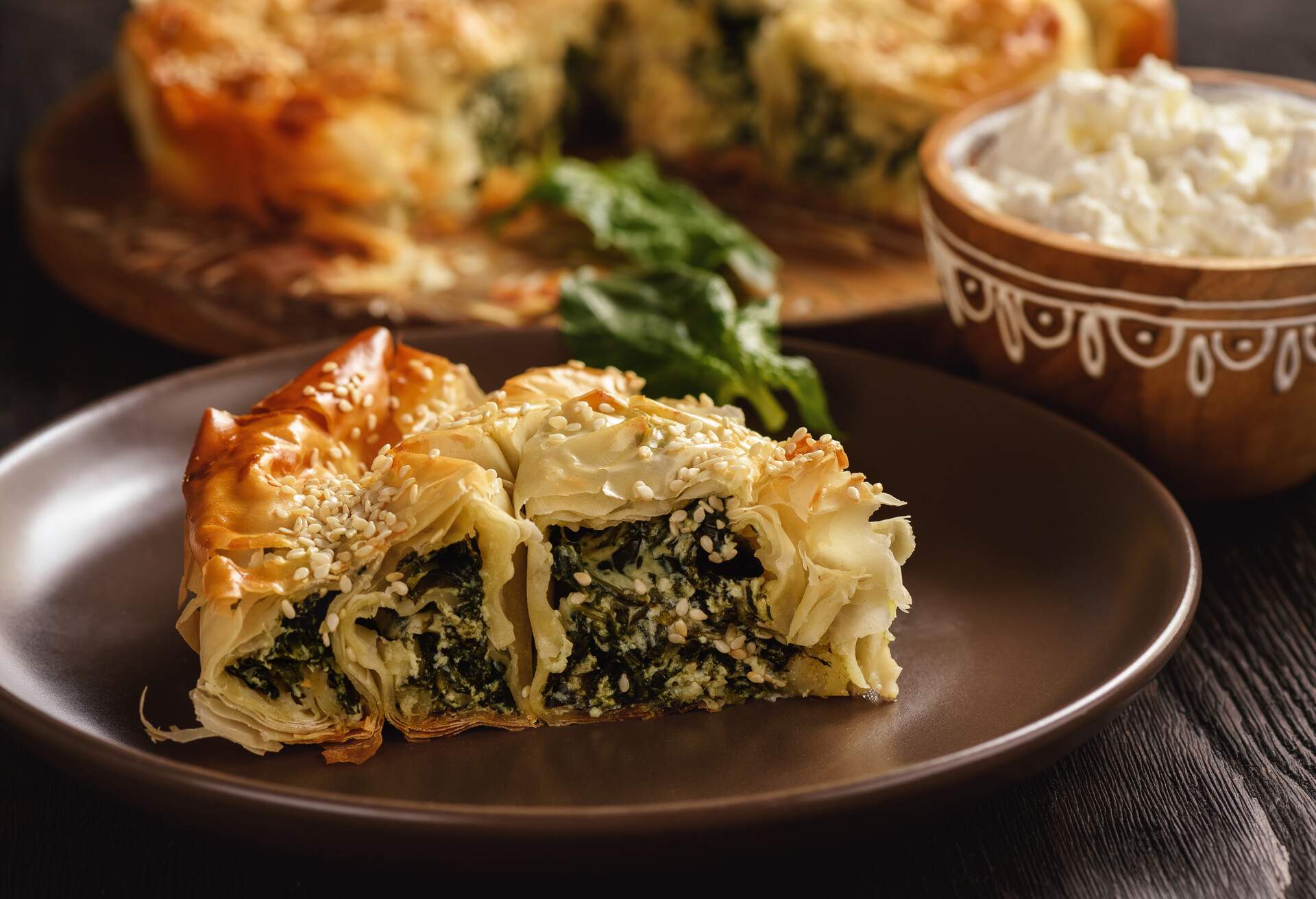 Burek or borek, balkanian puff pastry with spinach.