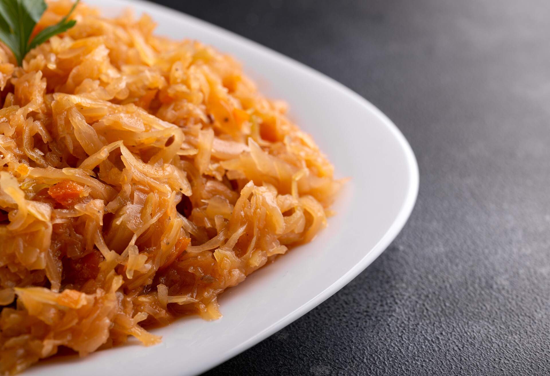 Traditional Homemade Stewed cabbage on white plate