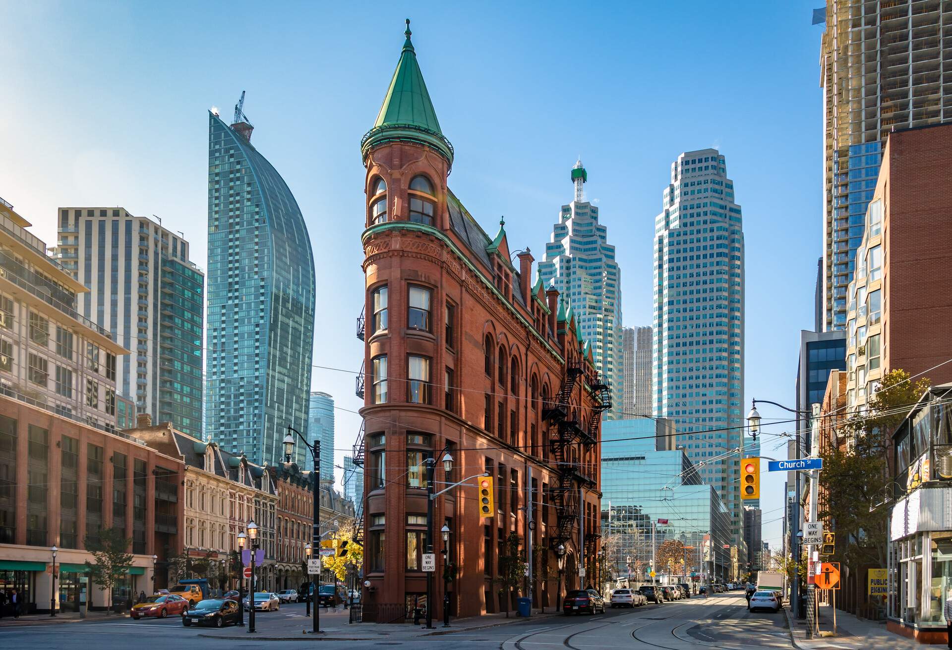 Building in downtown Toronto with CN Tower on background - Toronto, Ontario, Canada