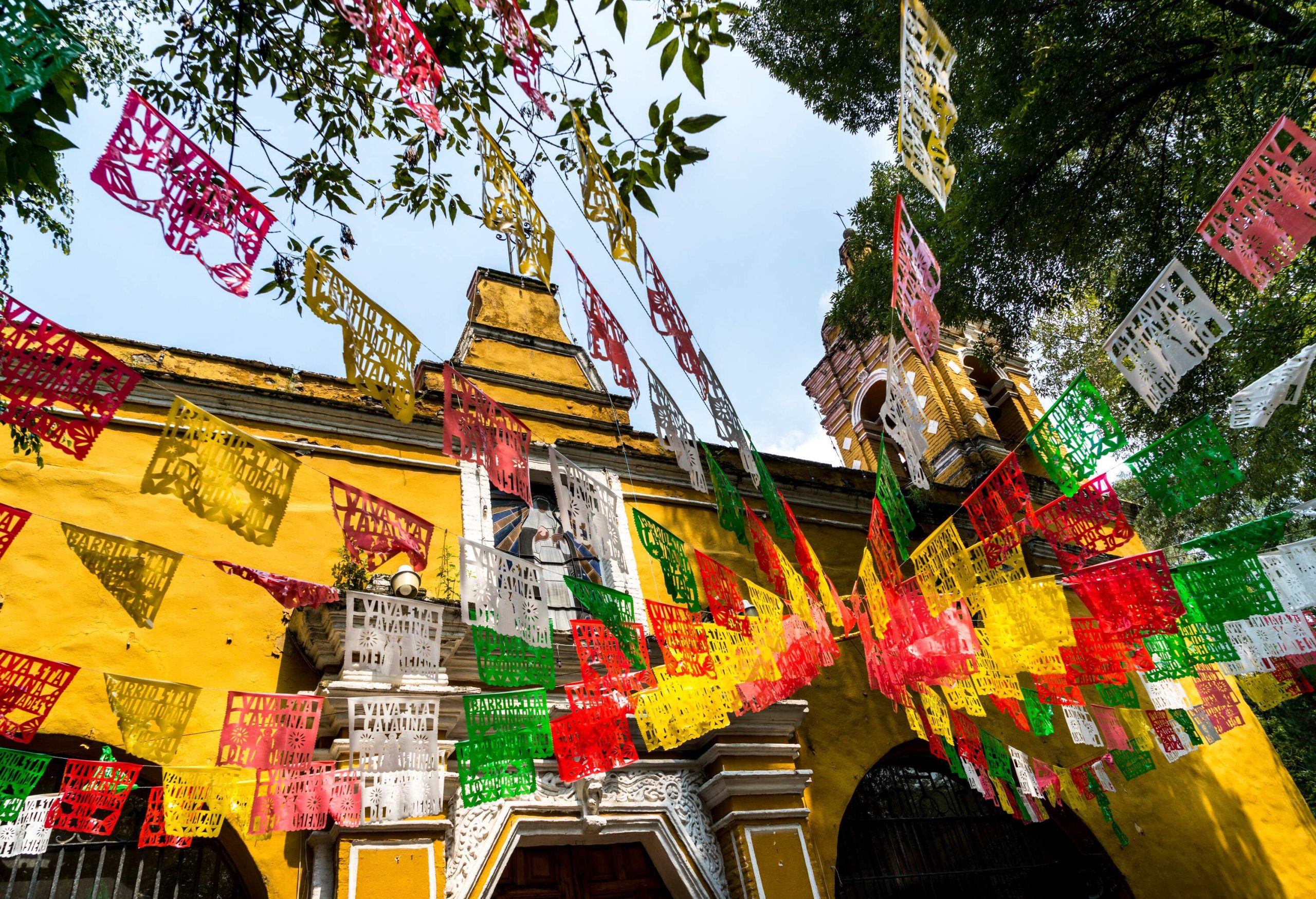 Colourful paper banners hung outside the church.