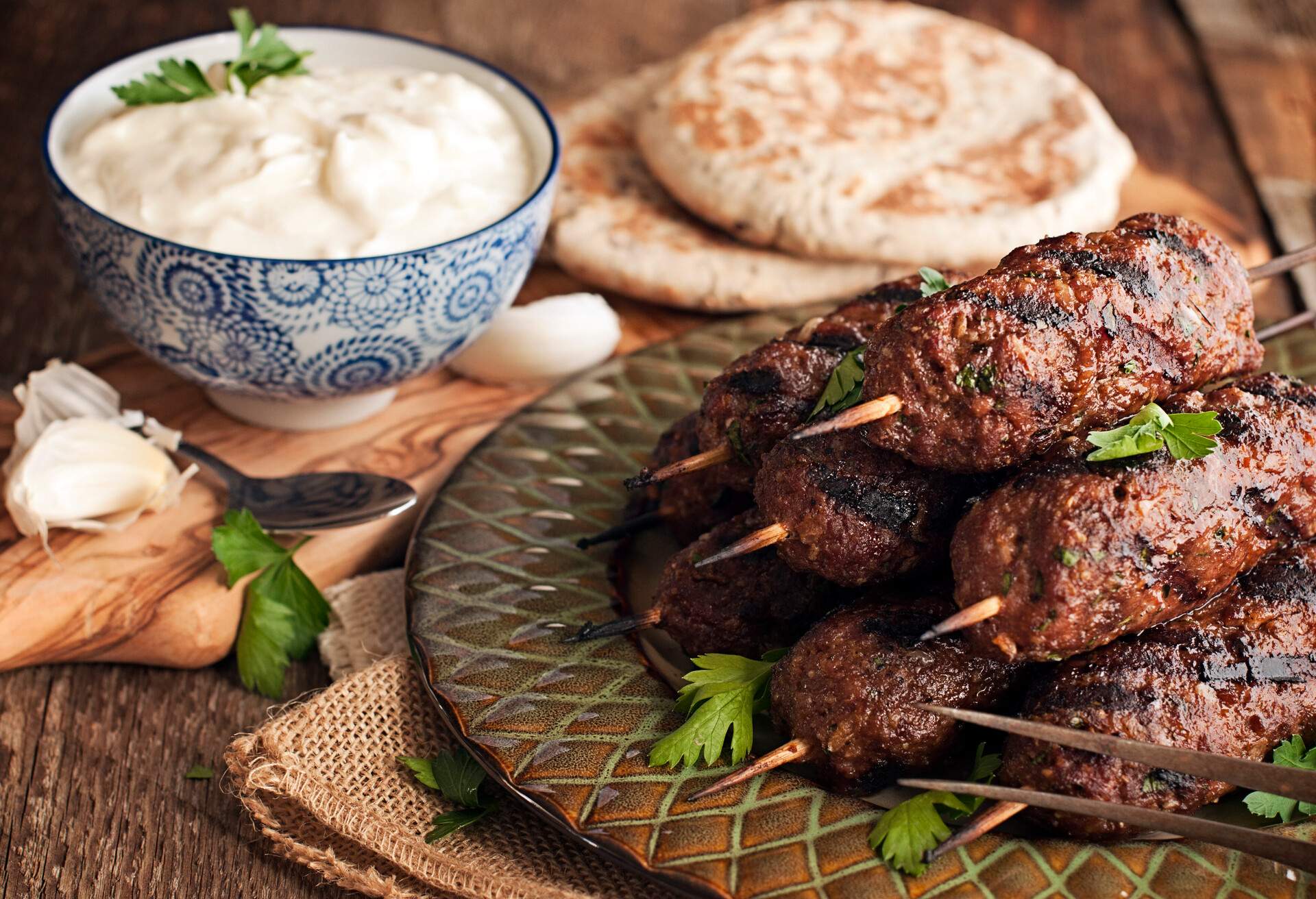 Lamb kababs with cool sauce and pita 