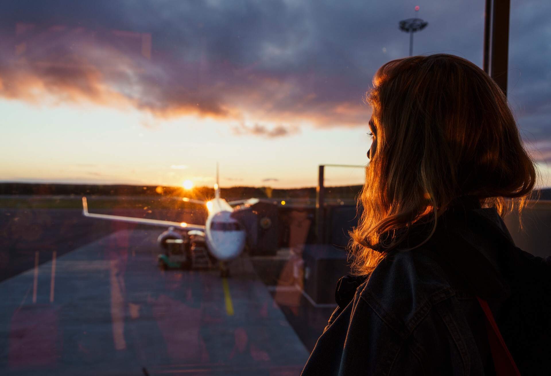 THEME_FLIGHT_AIRPORT_PEOPLE_WOMAN_GettyImages-1073817850