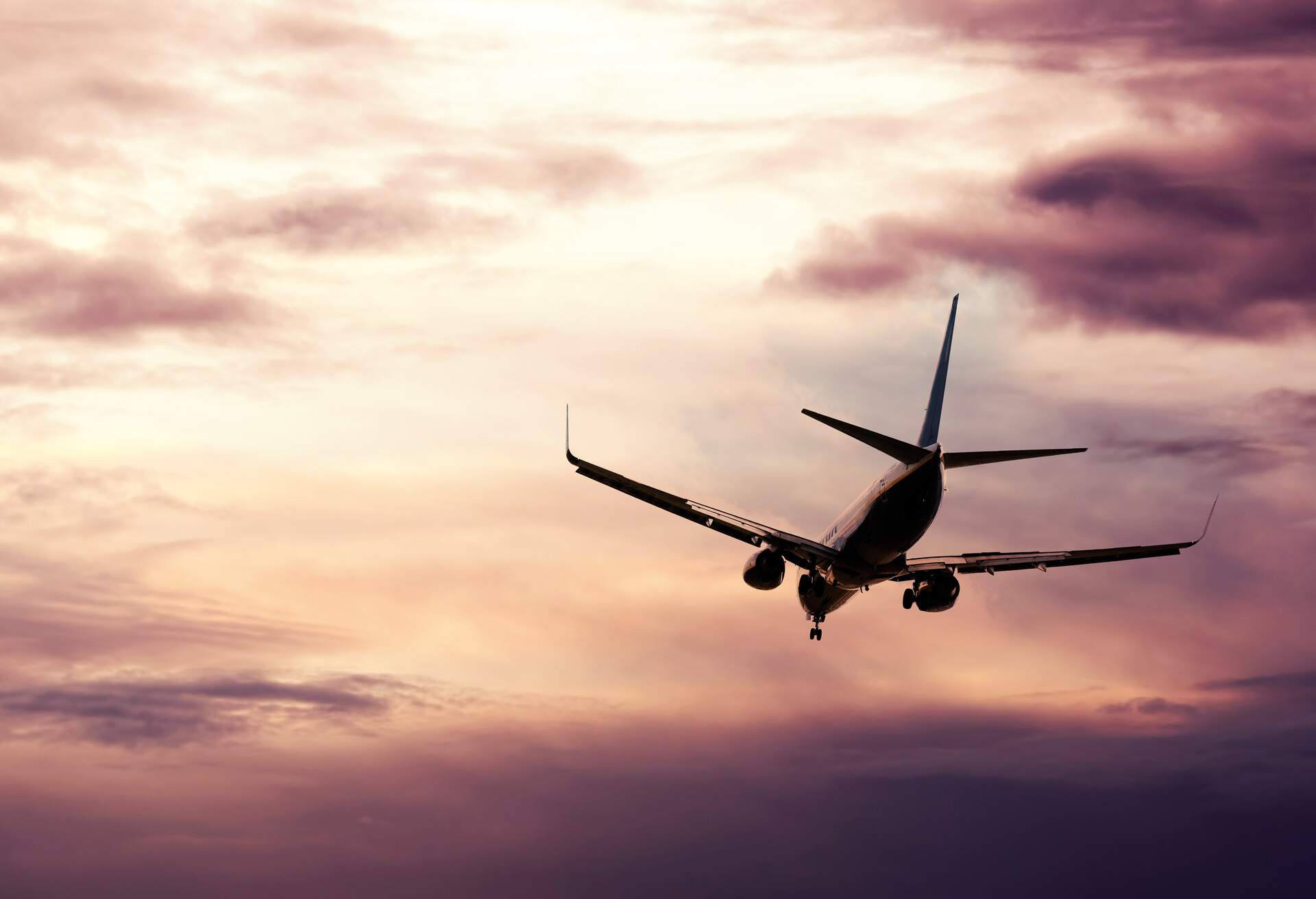 THEME_FLIGHT_PLANE_SKY_GettyImages-1204778477