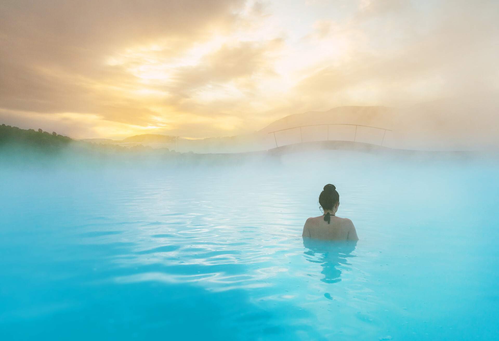 DEST_ICELAND_REYKJAVIK_BLUE-LAGOON_THEME_PEOPLE_WOMAN_RELAXING_GettyImages-1227527656