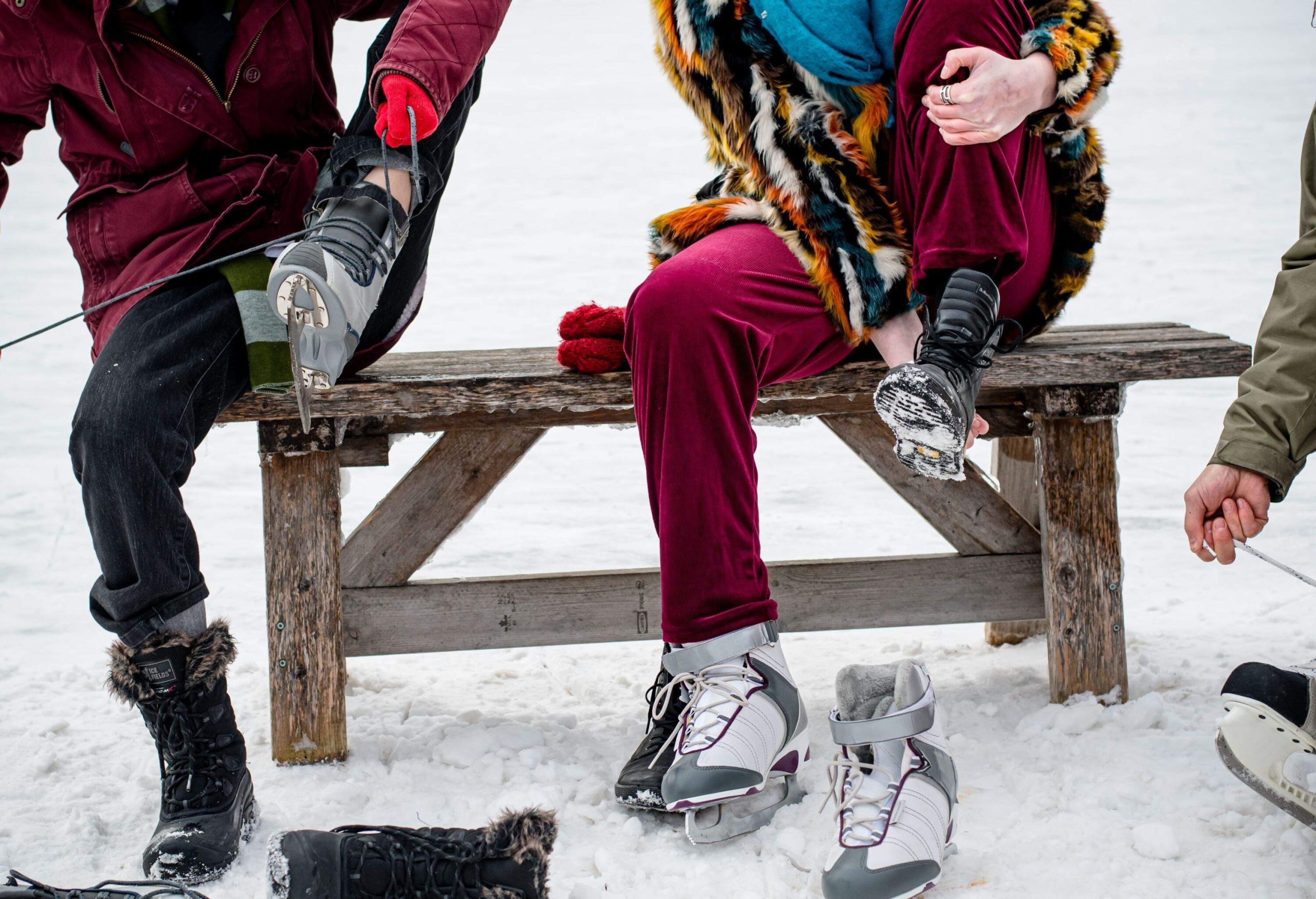 Winter preparations take center stage as the trans teen gets ready for skating by the lake, surrounded by the laughter and support of their chosen family, creating a scene of anticipation and camaraderie