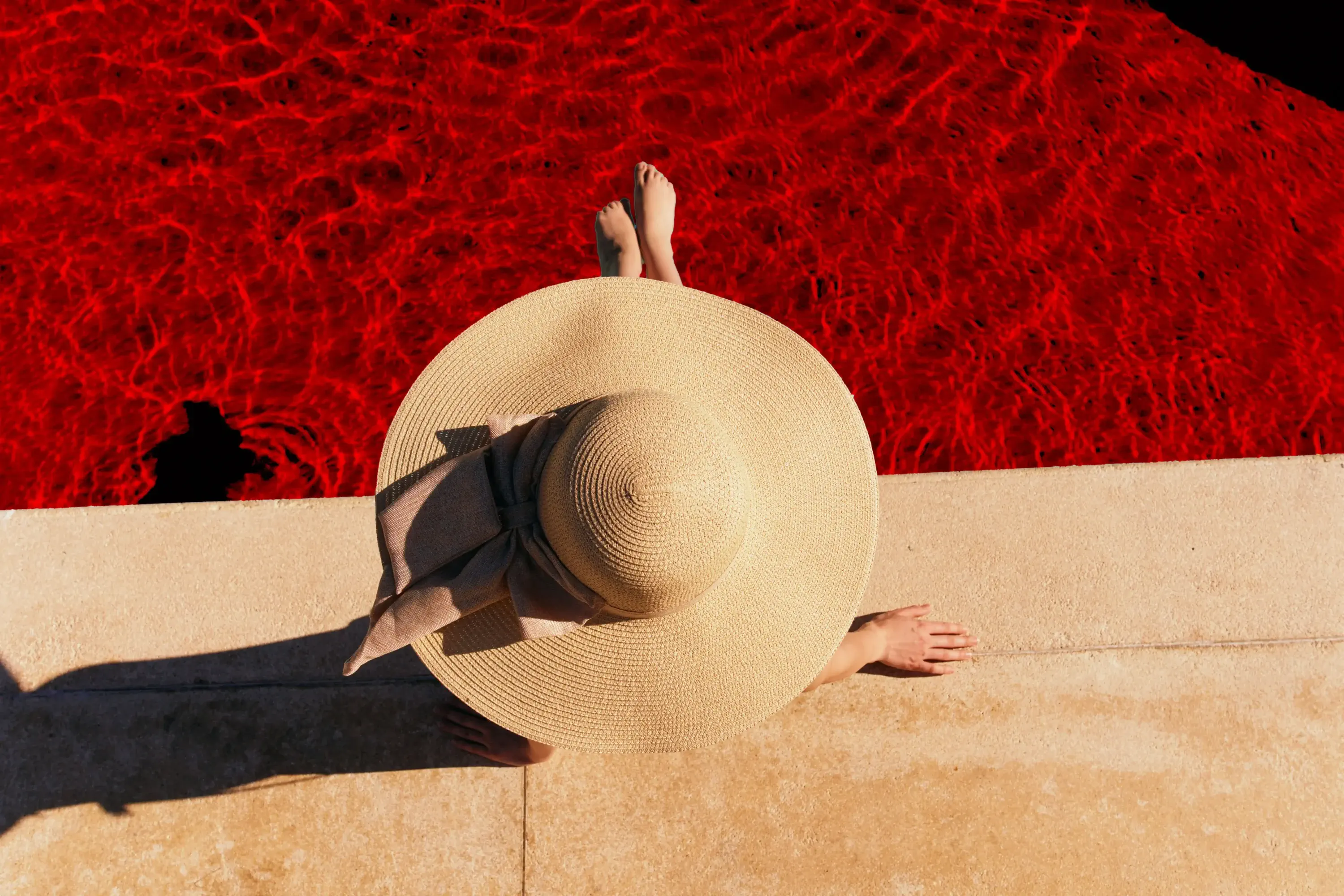theme_person_woman_pool_gettyimages-1209962721_universal_within-usage-period_78585-red