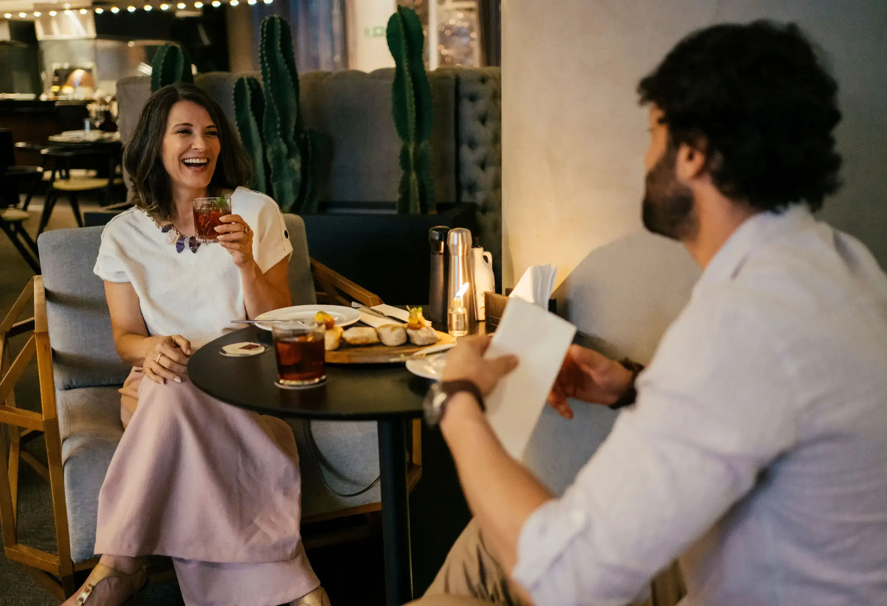 Couple having a dinner at the hotel bar