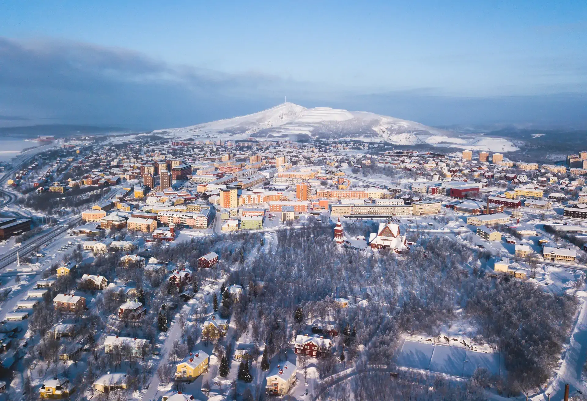 Aerial winter view of Kiruna, the northernmost town in Sweden, province of Lapland, winter sunny picture shot from drone