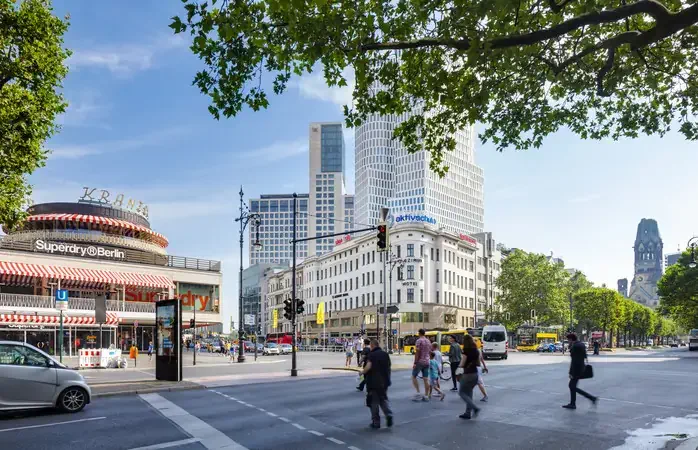 Kurfürstendamm, Berlin's famous boulevard. The Kaiser-Wilhelm-Gedächtniskirche (Kaiser Wilhelm Memorial Church) is visible on the right - Berlin, Germany