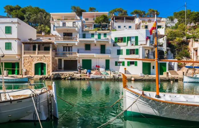 Boats in Canal in Cala Figuera, Mallorca, Balearic Islands, Spain.