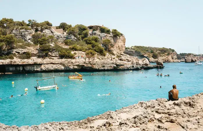 Amazing beach of Cala Llombards, Majorca island, Spain; Shutterstock ID 1153406848; Brand (KAYAK, Momondo, Any): Any