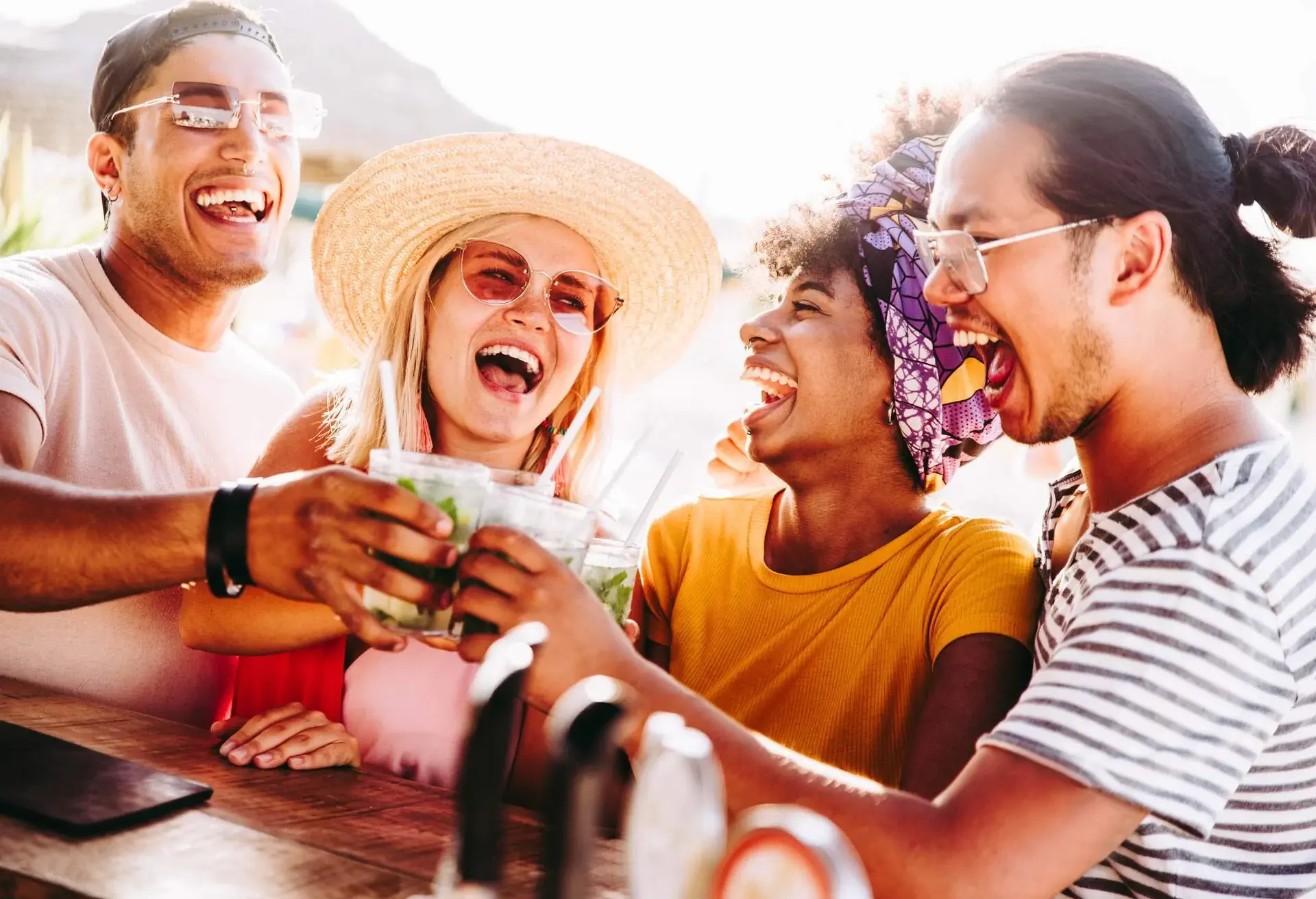 DEST_SPAIN_IBIZA_THEME_BEACH_PARTY_FRIENDS_GettyImages-1328877685-1.jpg