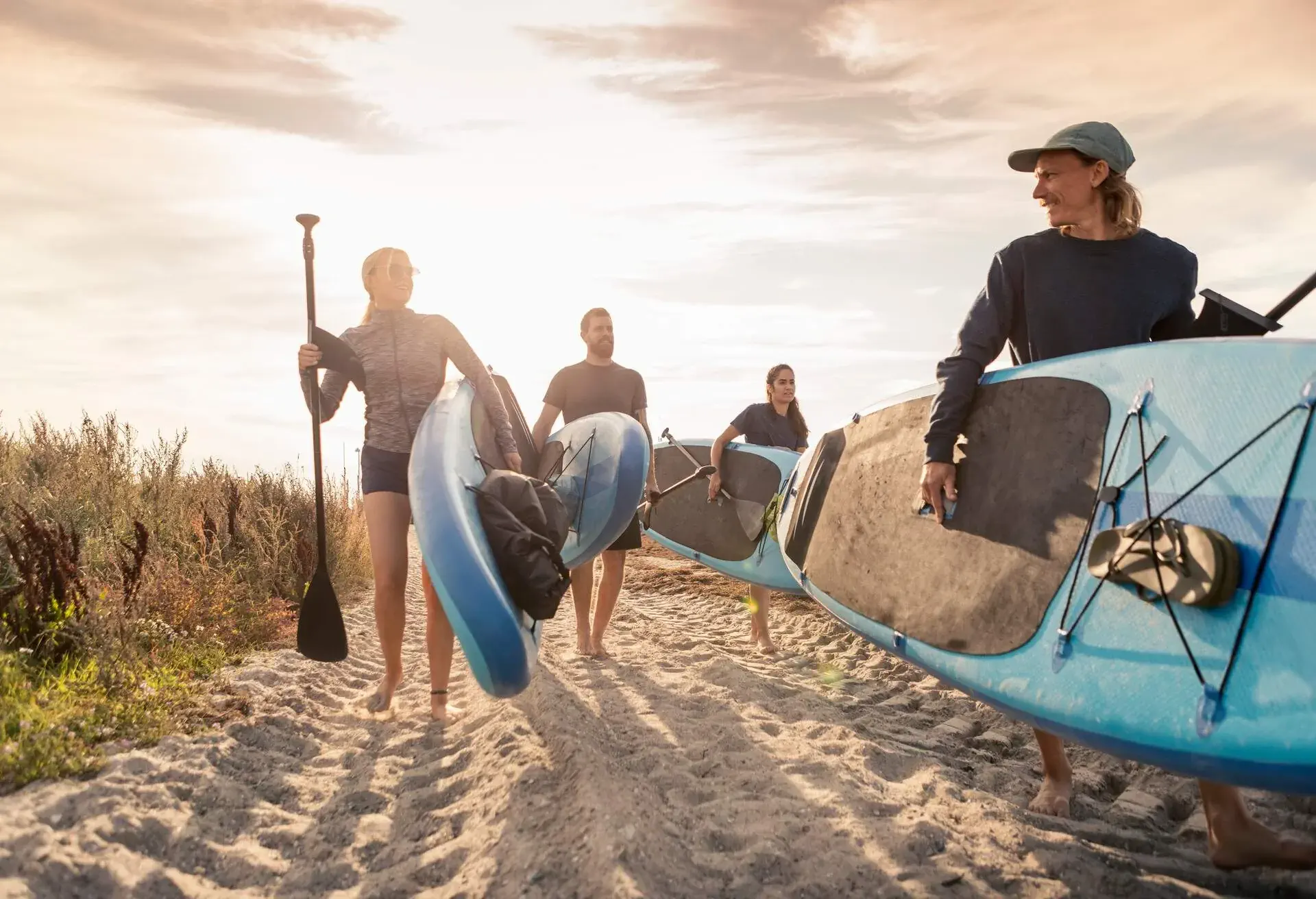 DEST_SWEDEN_MALMO_THEME_PEOPLE_FRIENDS_PADDLEBOARDING_GettyImages-1345020314