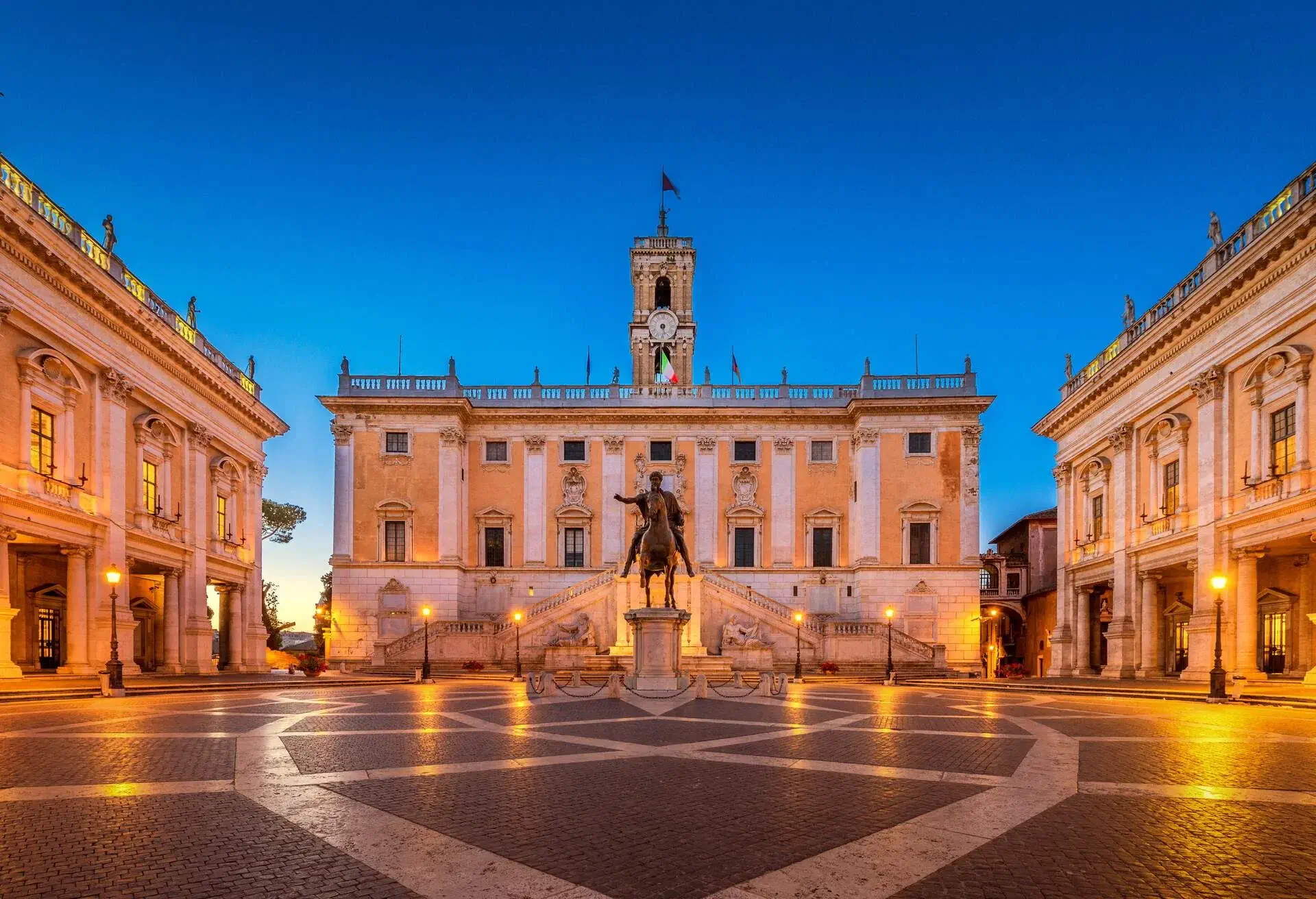 Piazza del Campidoglio on the top of Capitoline Hill with the facade of Palazzo Senatorio and the replica of Equestrian Statue of Marcus Aurelius in Rome, Italy