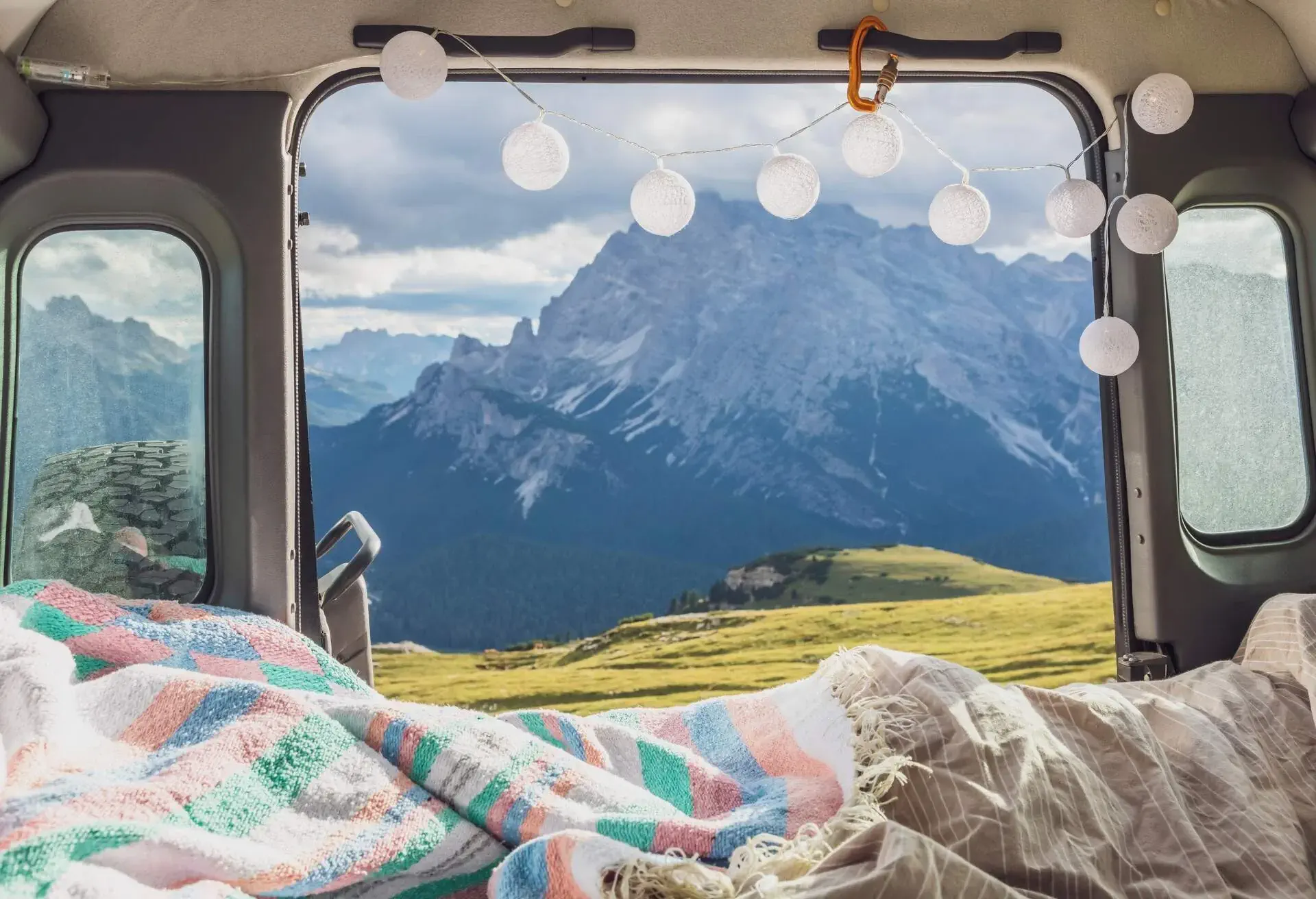 Scenic view of mountain range against sky seen from campervan- Sesto Dolomites- Dolomites- Alto Adige- Italy; Shutterstock ID 1895483095; purchase_order: ; job: ; client: ; other: