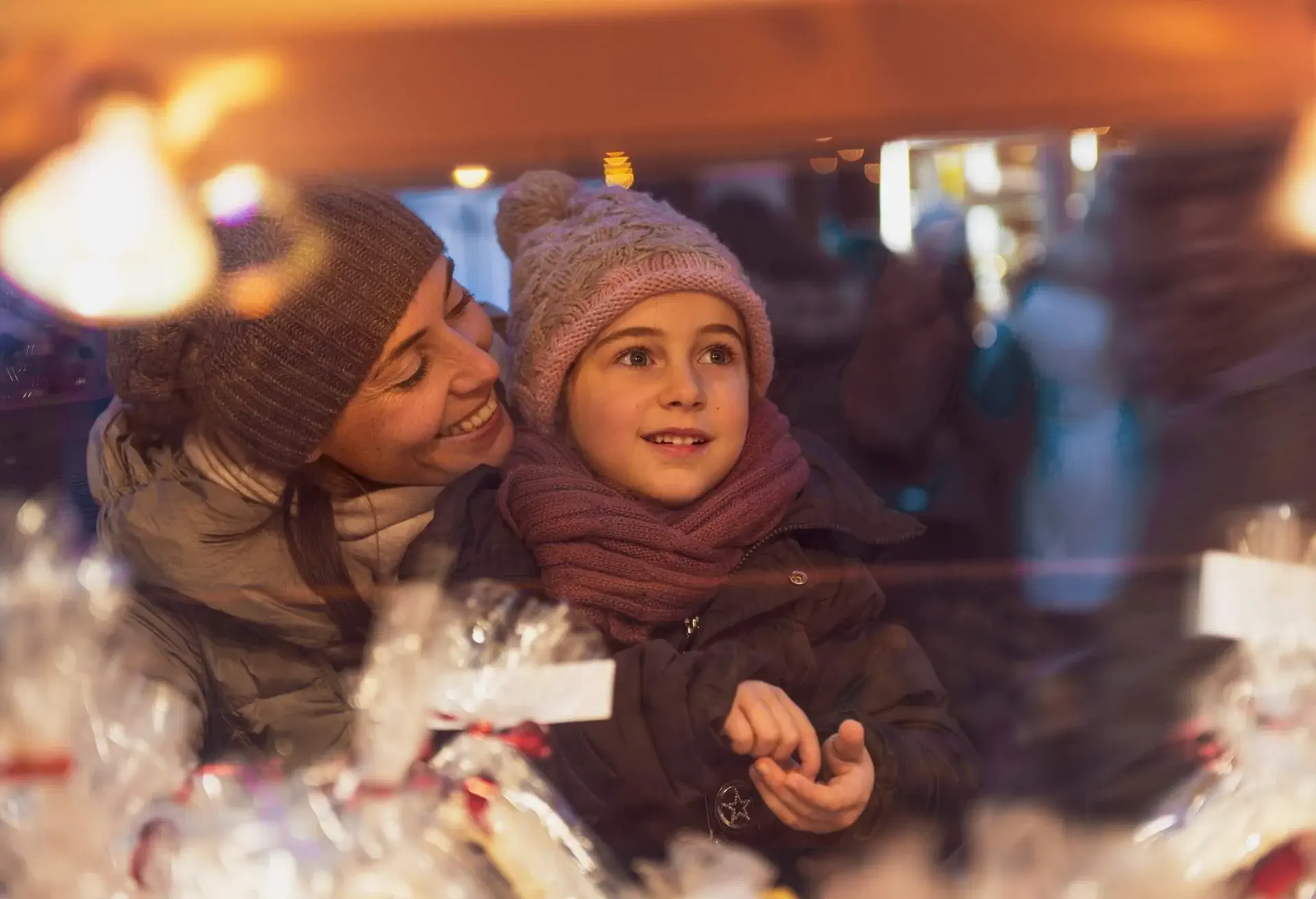 Family at christmas market at winter time in December - vintage look
