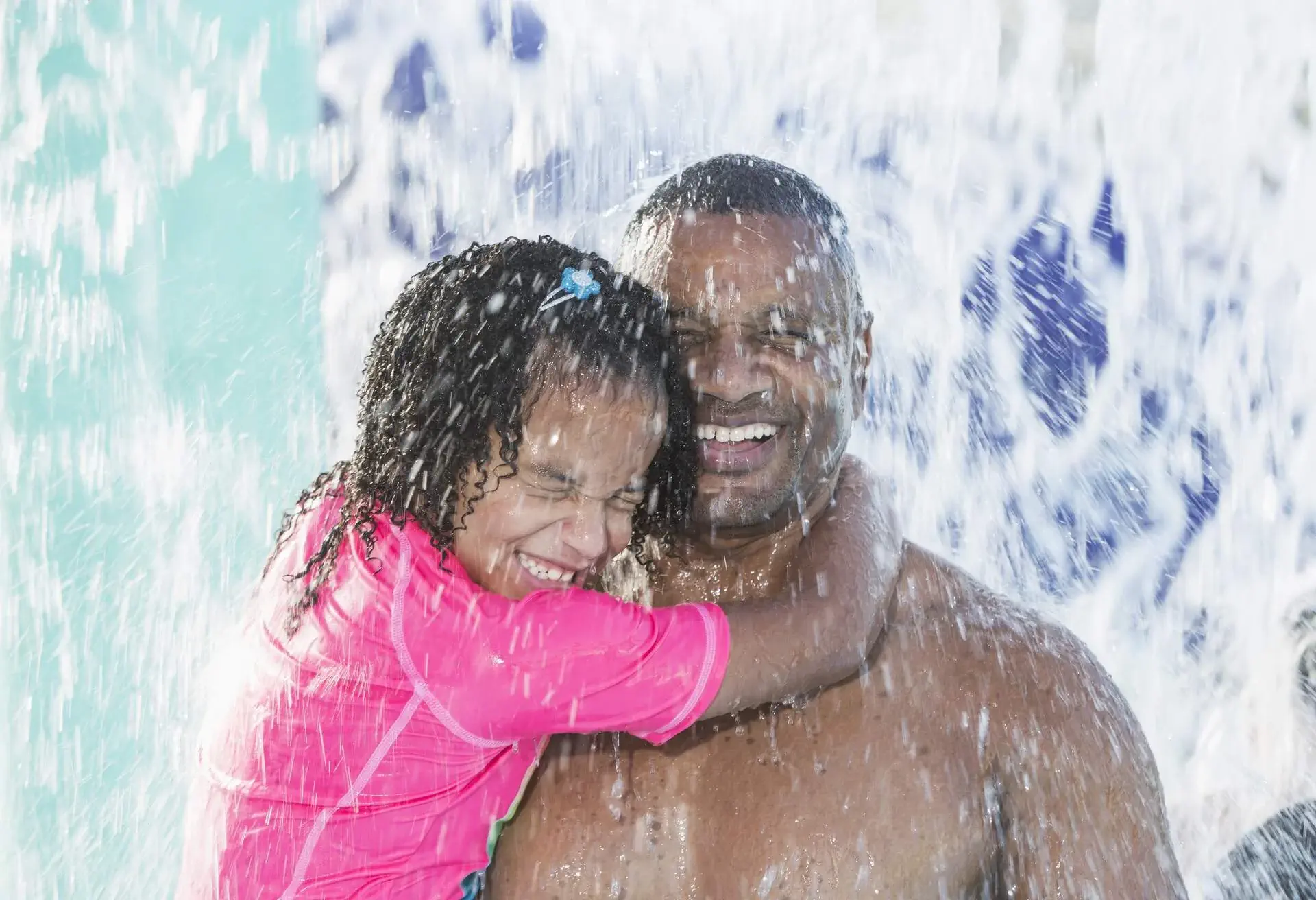father and kid in the waterpark