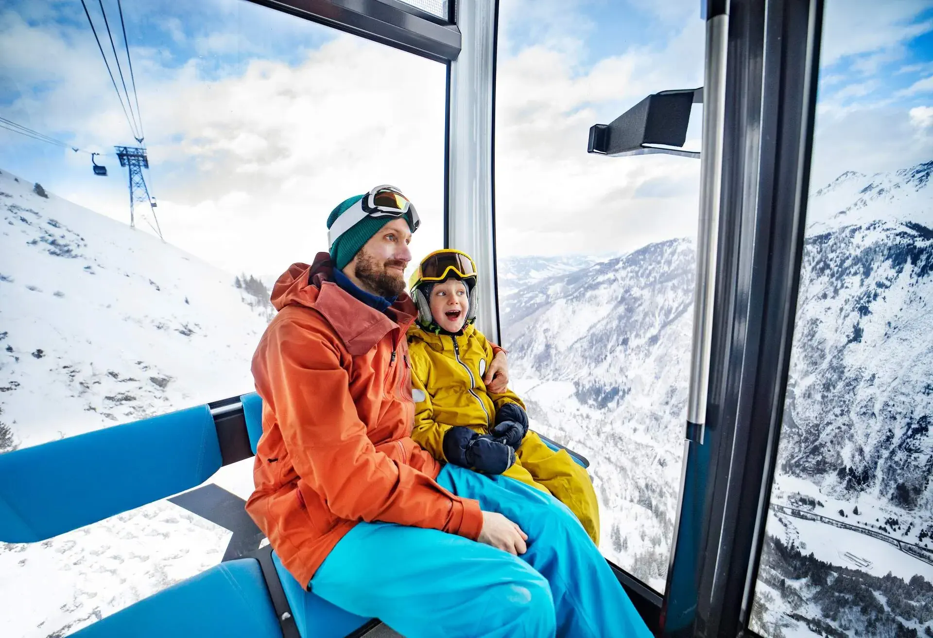 THEME_PEOPLE_MAN_KID_BOY_SKI_LIFT_GettyImages-1285903386