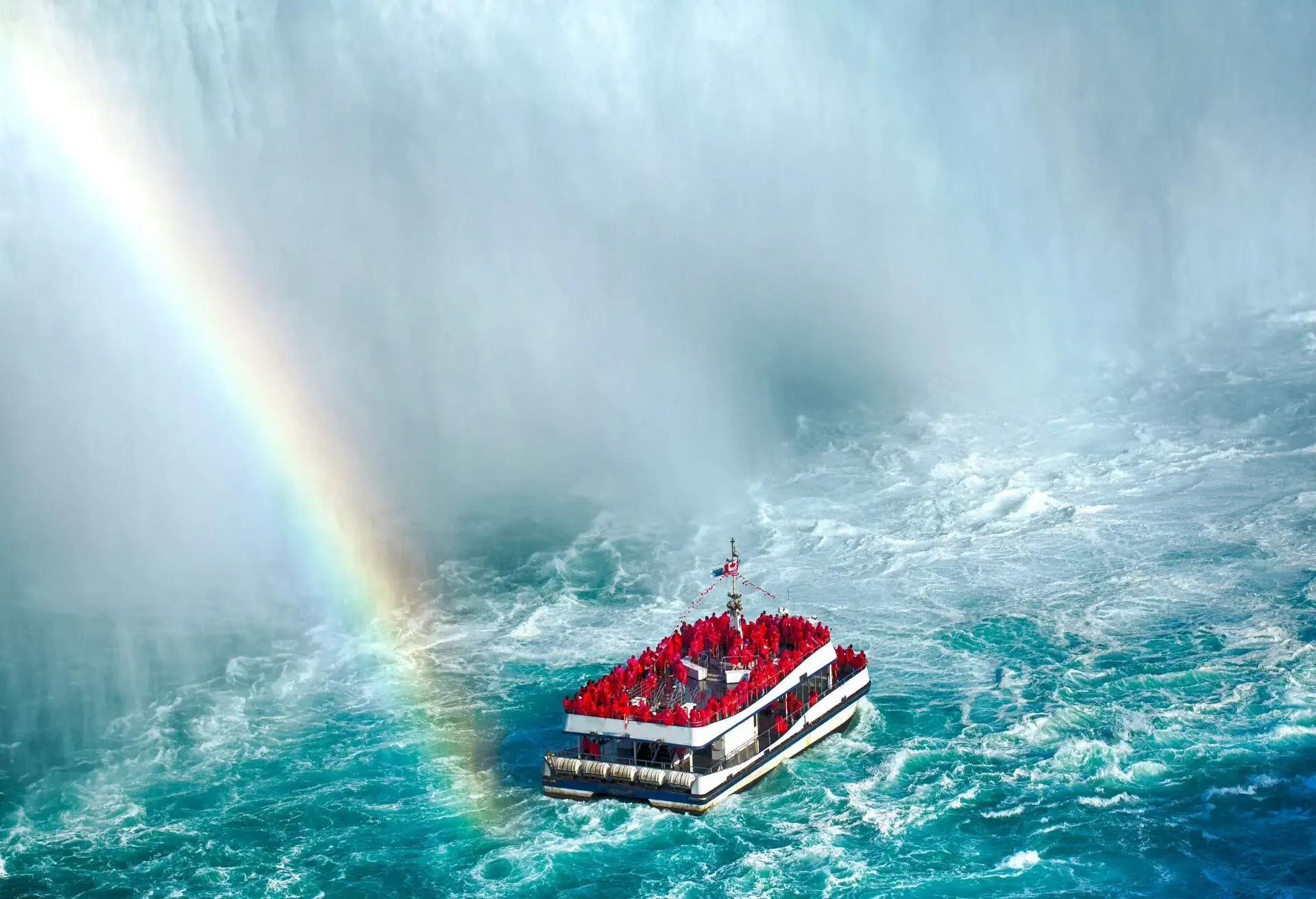 DEST_CANADA_NIAGARA_FALLS_TOURIST_BOAT_RAINBOW_GettyImages-1255223855