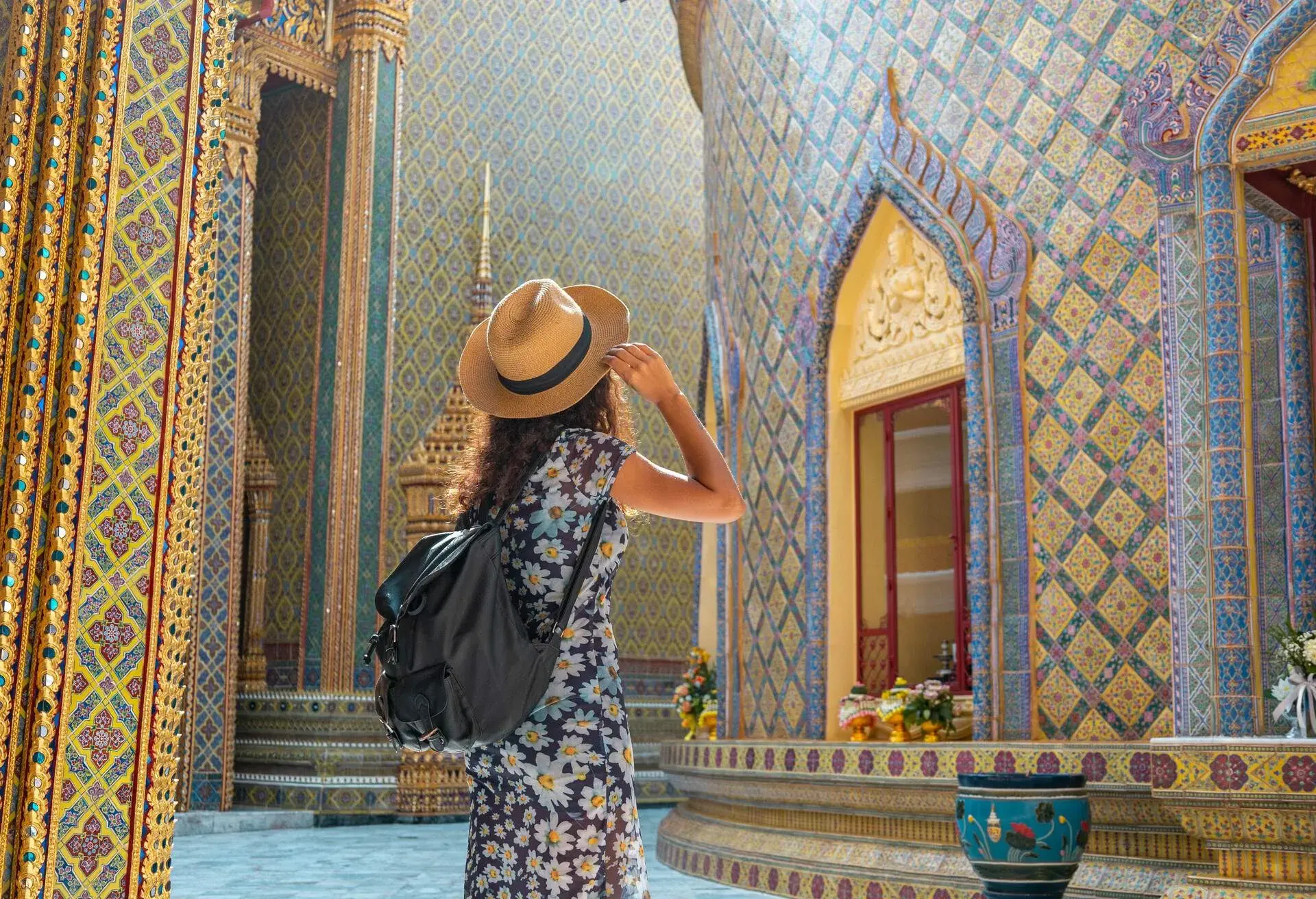 DEST_THAILAND_BANGKOK_WAT_RATCHABOPHIT_TEMPLE_PEOPLE_WOMAN_GettyImages-1366433807